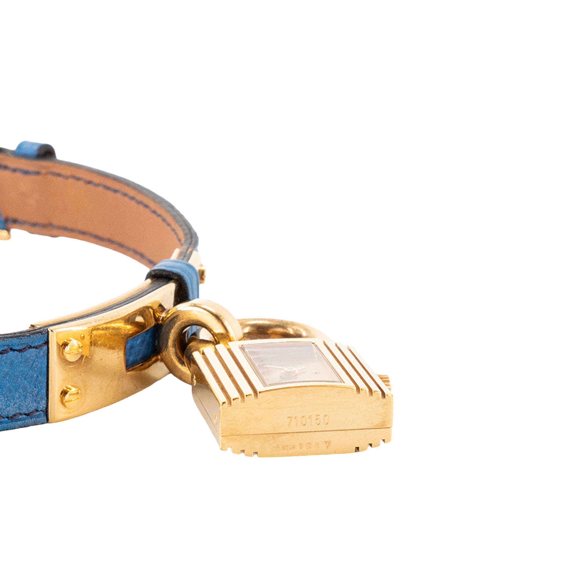 HERMÈS - Montre Kelly Hermès en cuir grainé bleu et métal doré