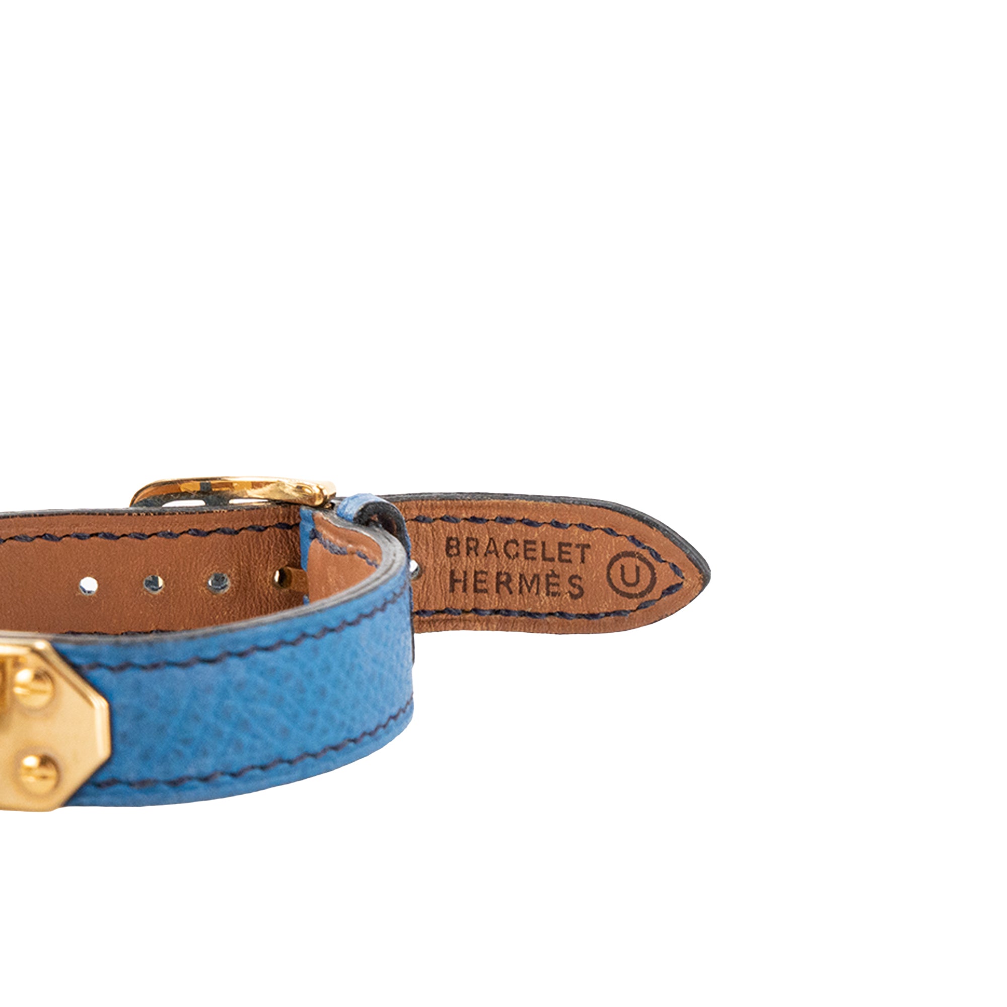 HERMÈS - Montre Kelly Hermès en cuir grainé bleu et métal doré