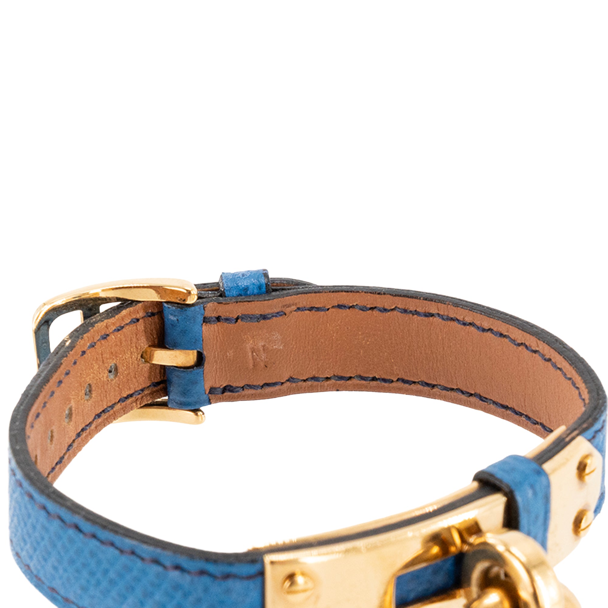 HERMÈS - Montre Kelly Hermès en cuir grainé bleu et métal doré