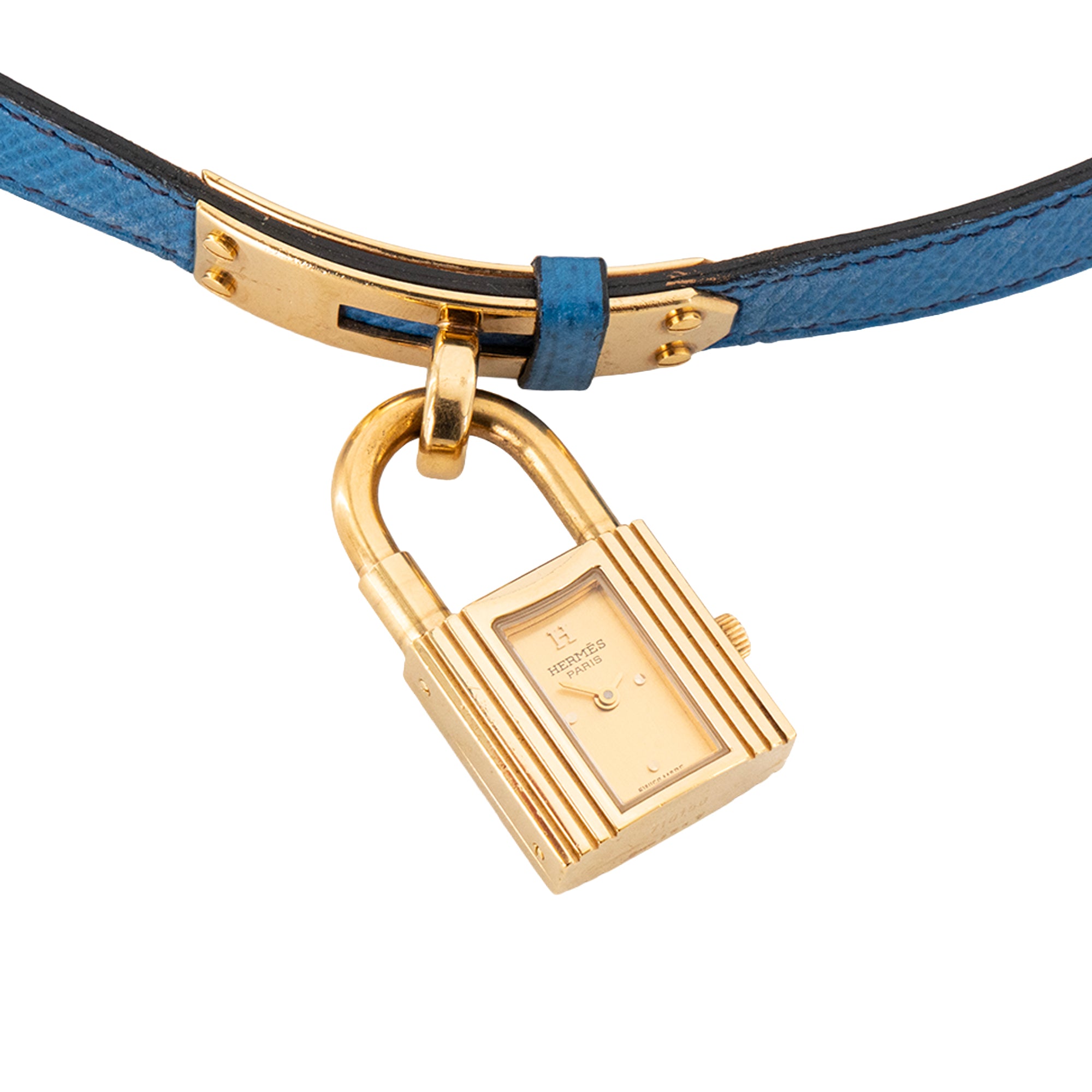 HERMÈS - Montre Kelly Hermès en cuir grainé bleu et métal doré