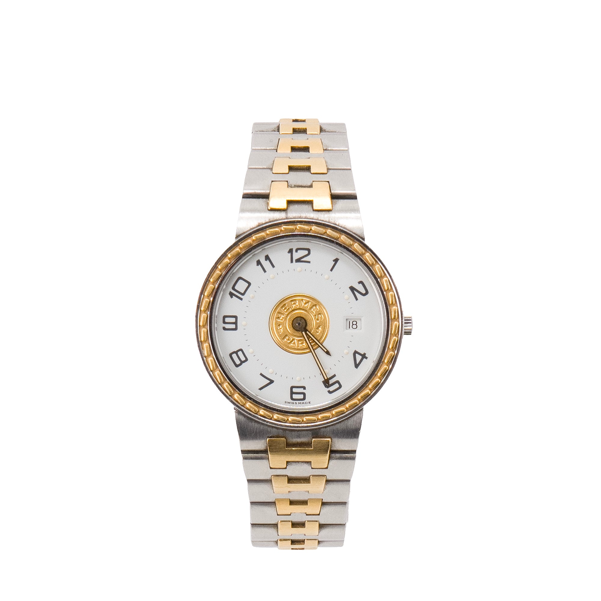 HERMÈS - Montre Sellier Hermès en acier argenté et doré