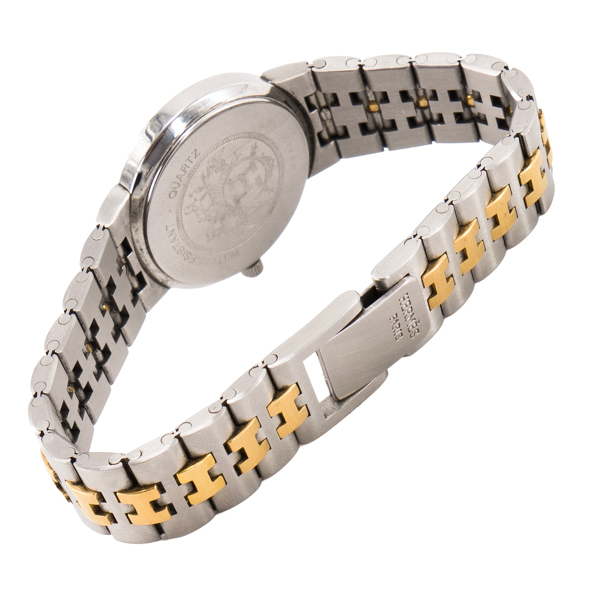 HERMÈS - Montre Sellier Hermès en acier argenté et doré