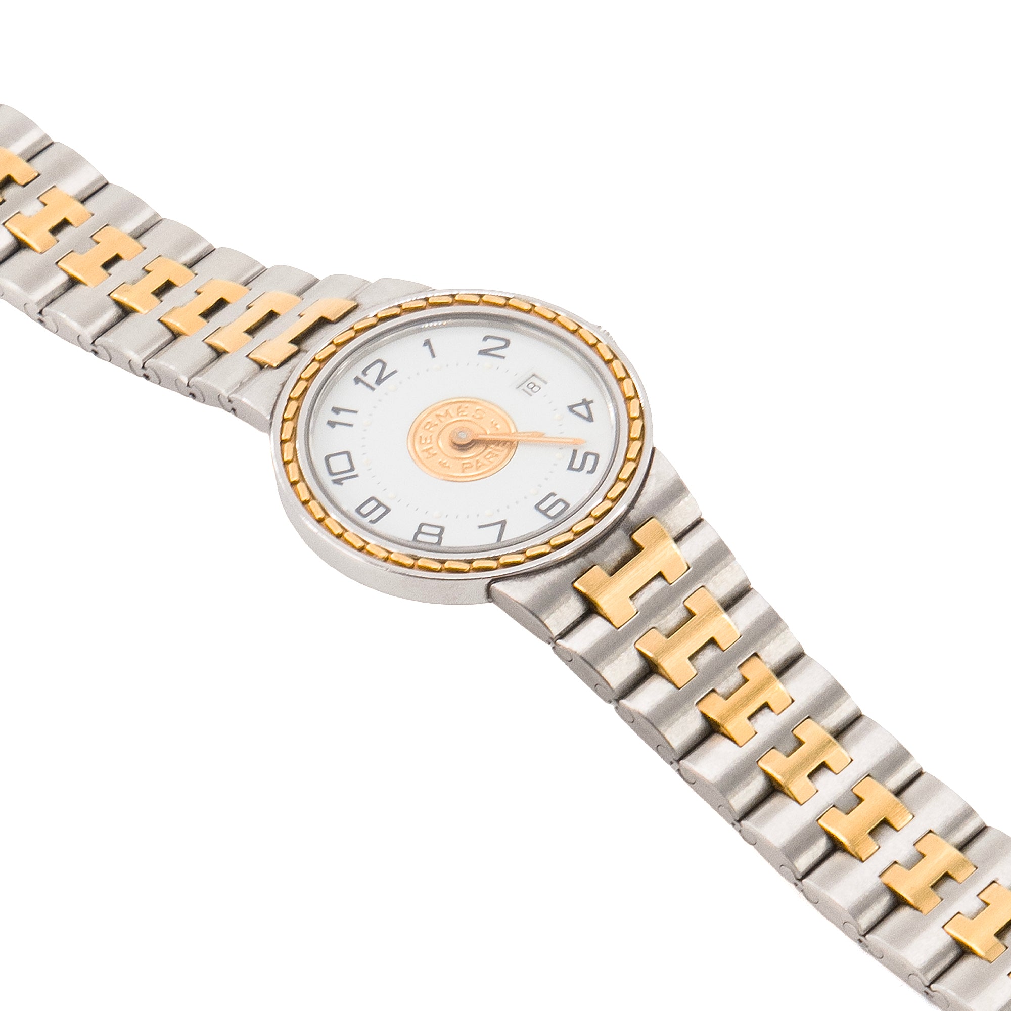 HERMÈS - Montre Sellier Hermès en acier argenté et doré