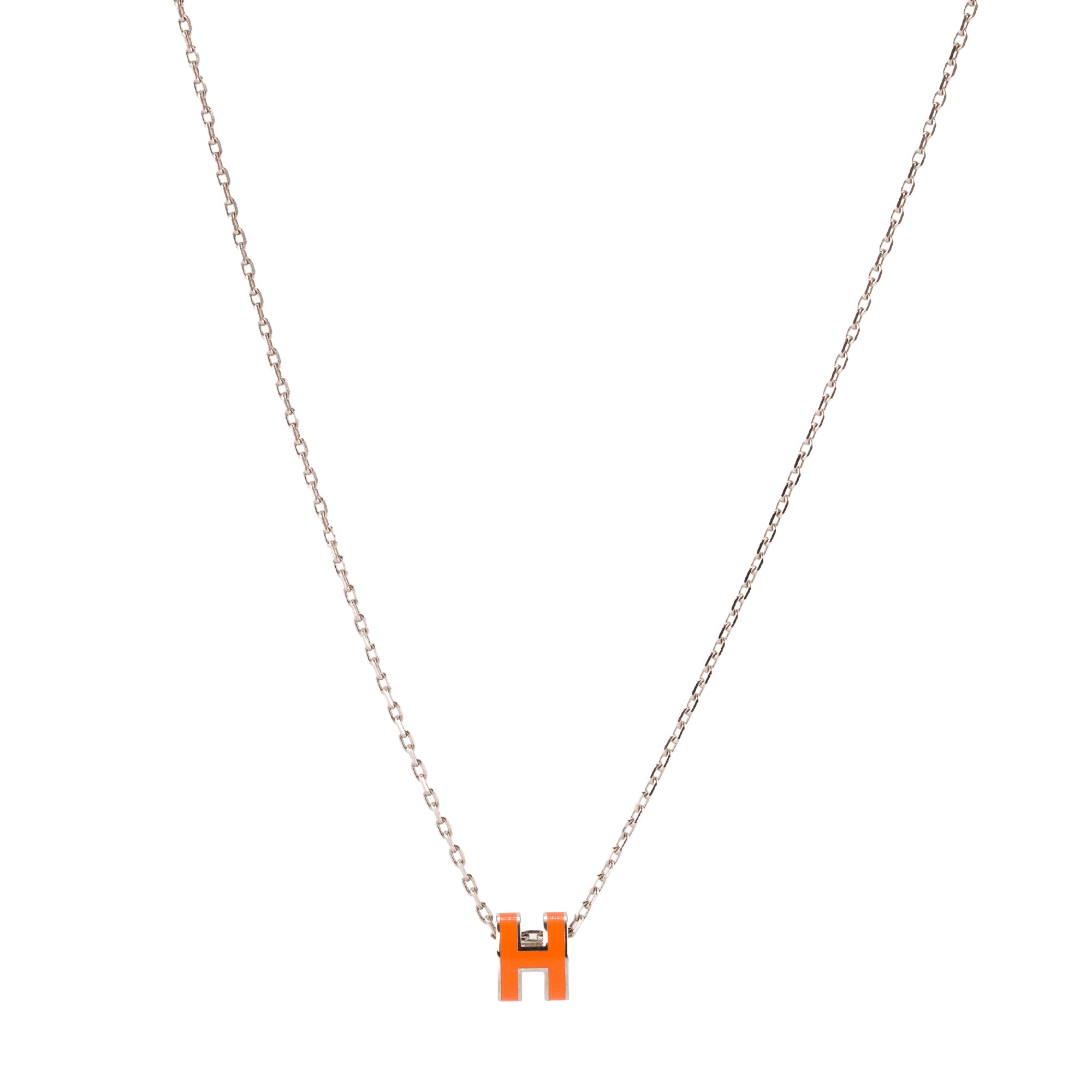 HERMES - Pendentif Pop H mini Hermès en émail orange et métal argenté