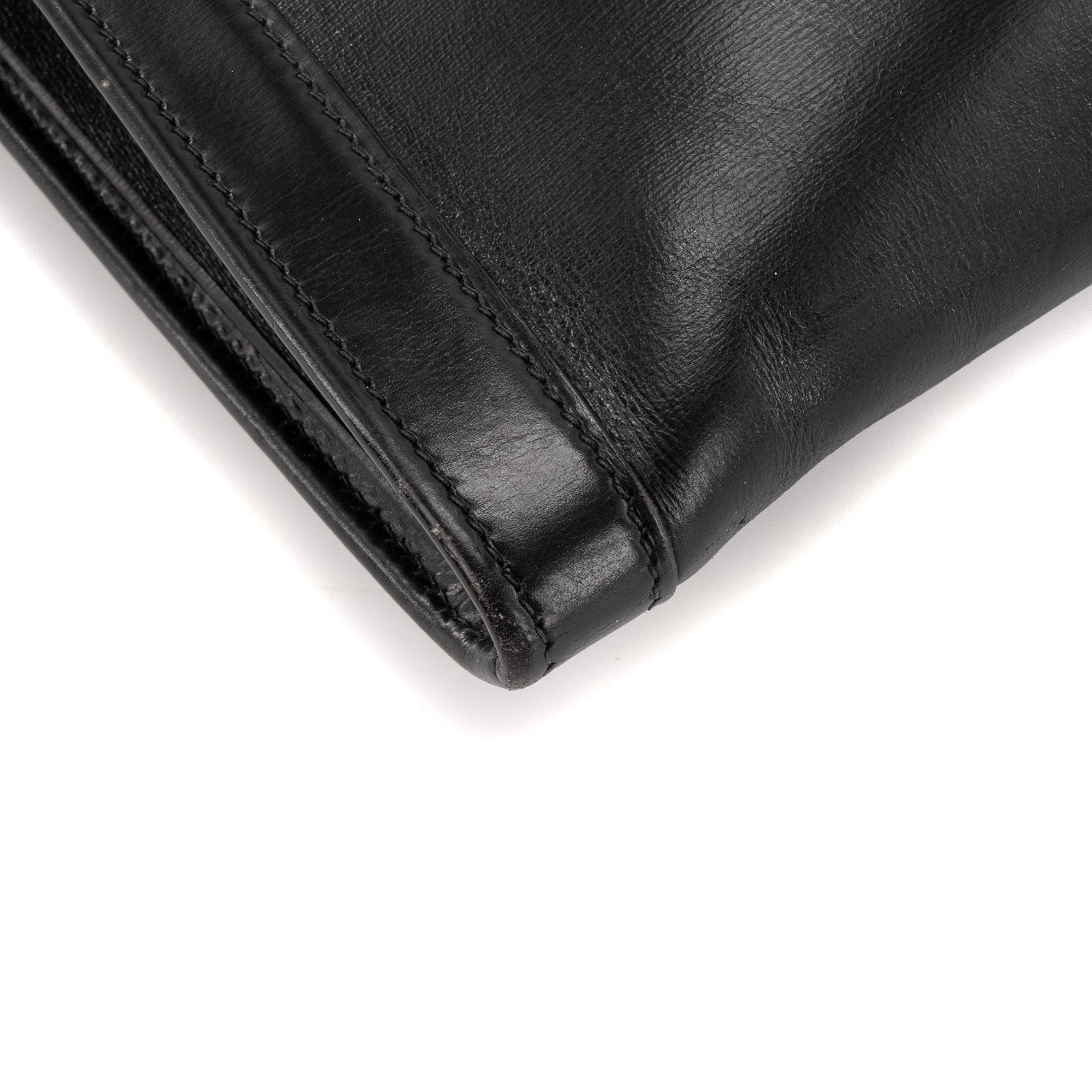 HERMÈS - Pochette Jige Hermès en cuir noir vintage