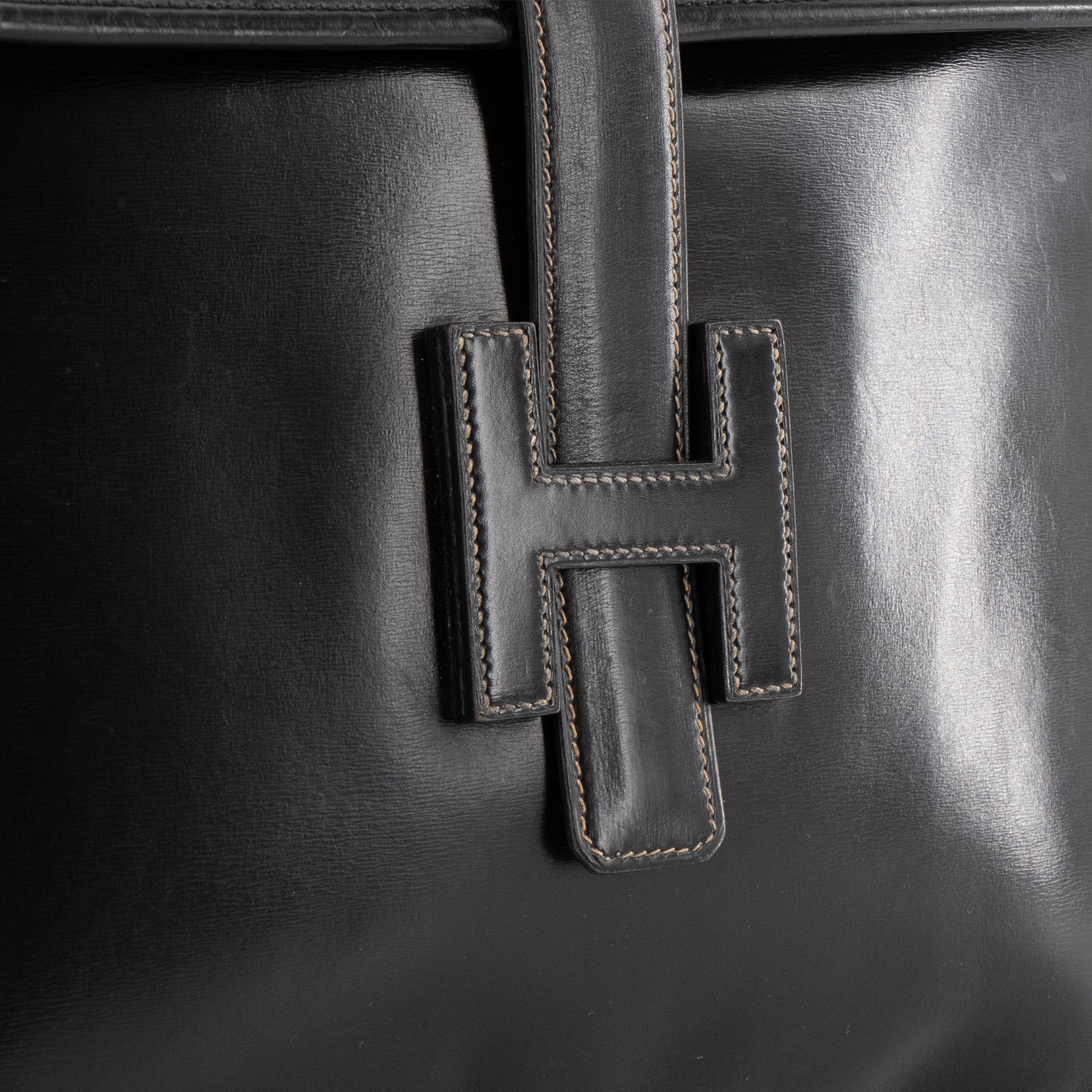 HERMÈS - Pochette Jige Hermès en cuir noir vintage