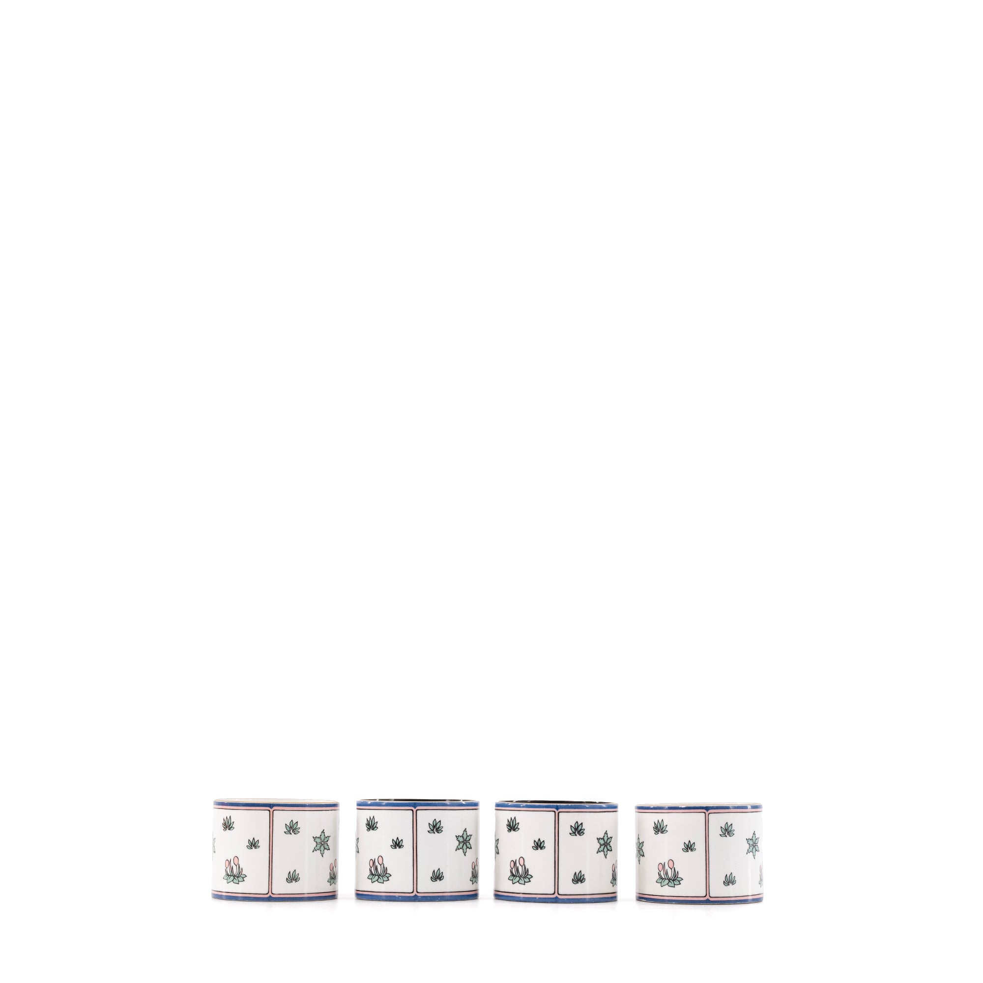 HERMÈS - Quatre Ronds de serviette Les Léopards Hermès en émail multicolore