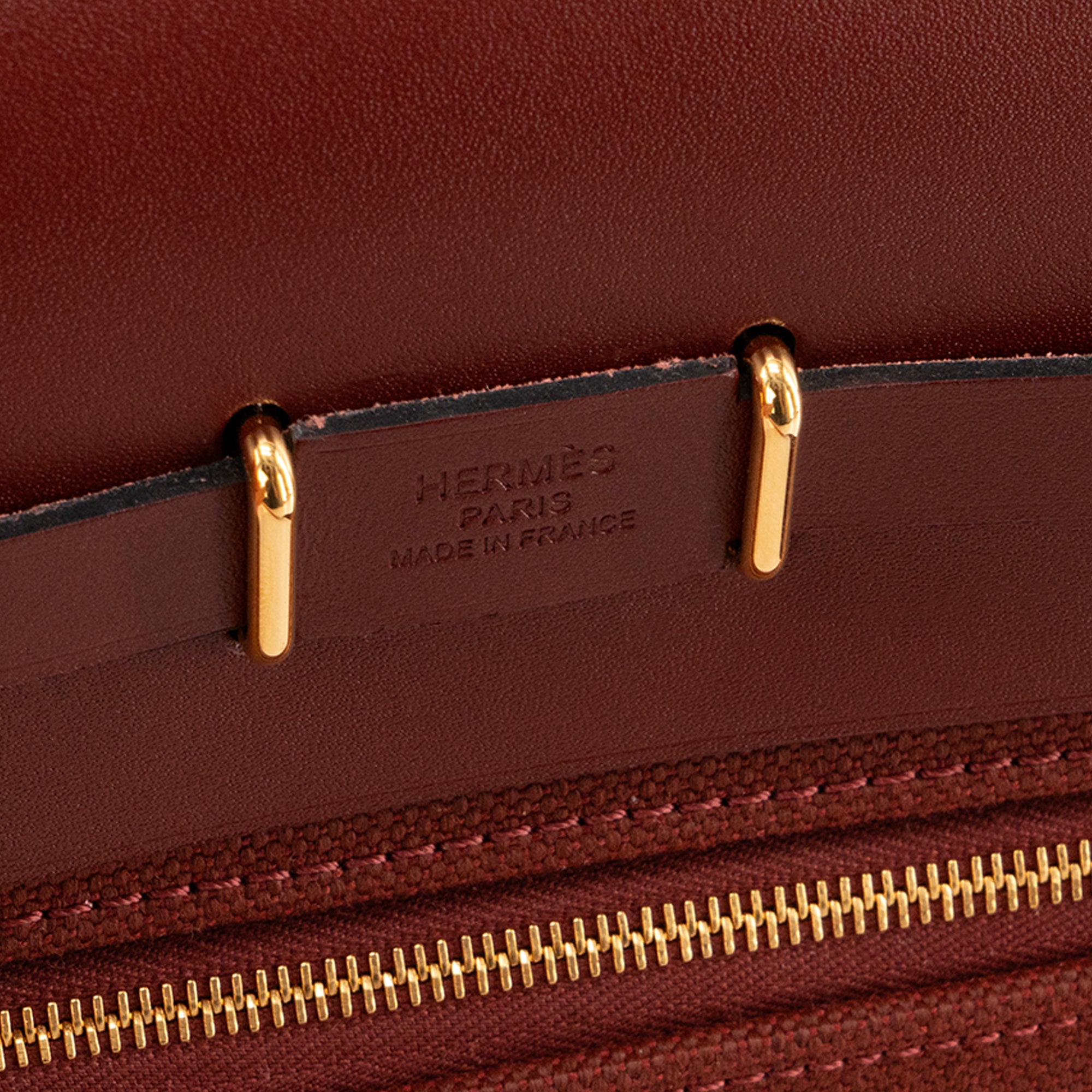 HERMÈS - Sac à bandoulière Herbag Mini Hermès en cuir lisse et toile rouge H