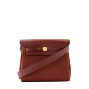 HERMÈS - Sac à bandoulière Herbag Mini Hermès en cuir lisse et toile rouge H