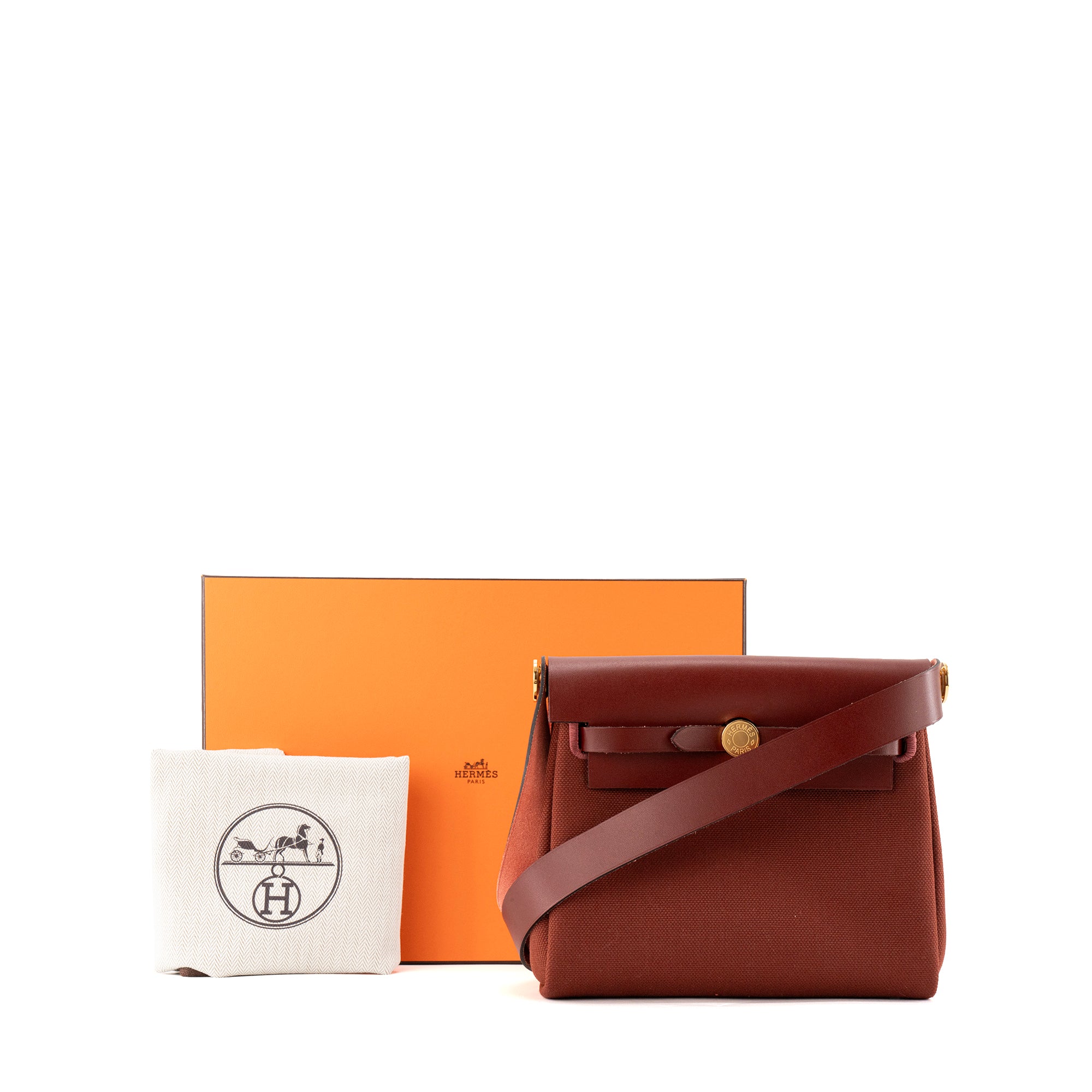 HERMÈS - Sac à bandoulière Herbag Mini Hermès en cuir lisse et toile rouge H