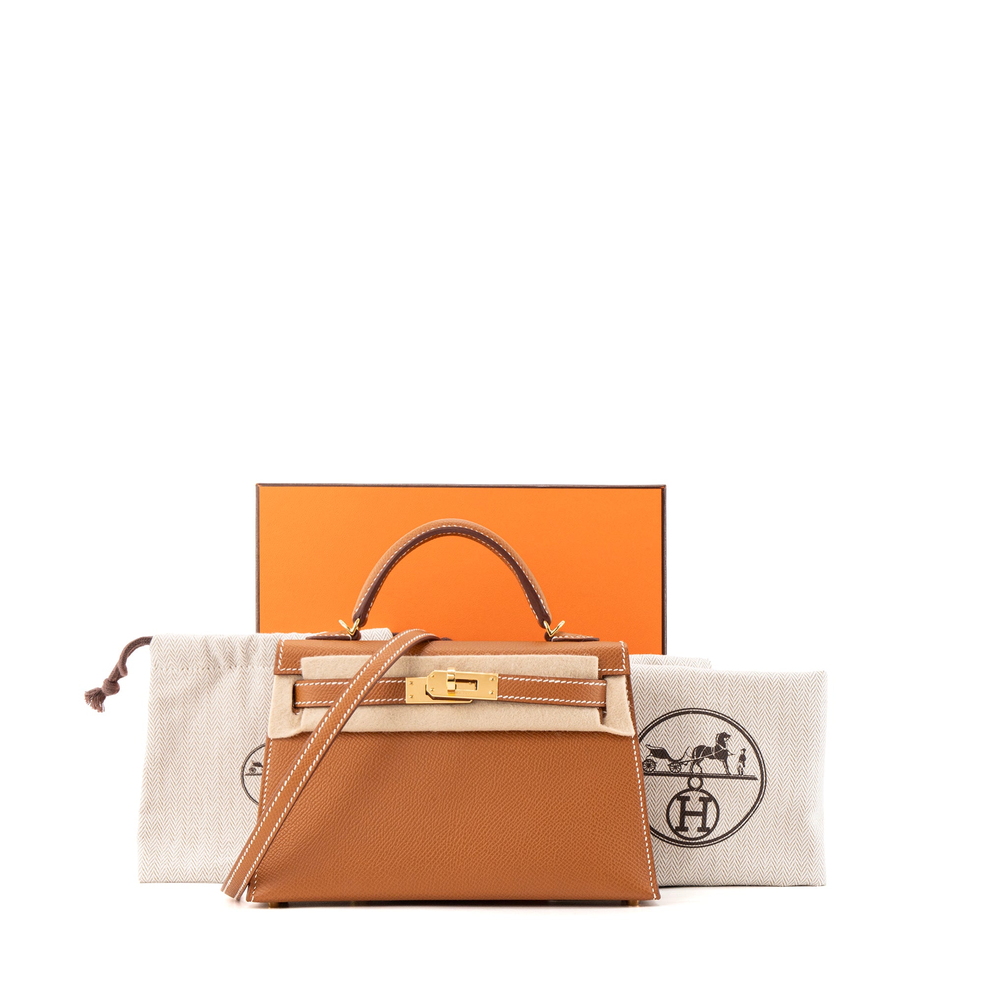 HERMÈS - Sac à bandoulière Kelly 20 mini Hermès en cuir epsom marron gold