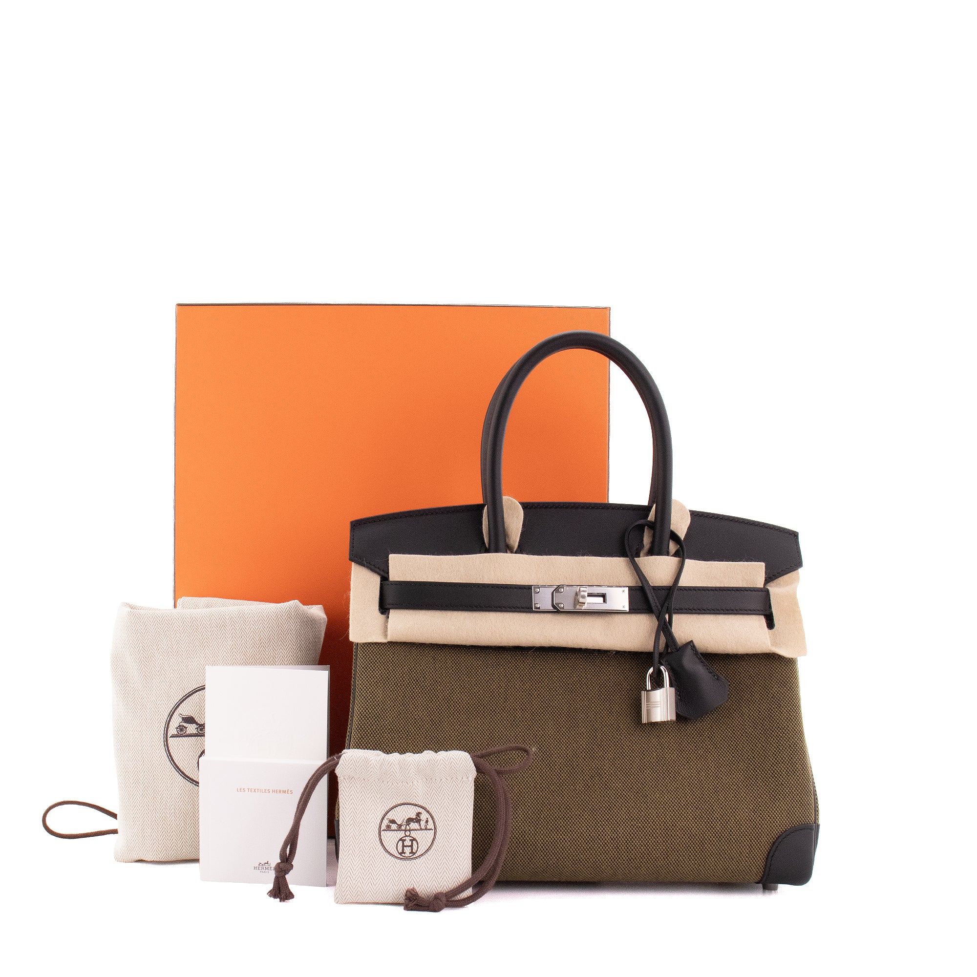 HERMÈS - Sac à main Birkin 30 Hermès en toile vert militaire et cuir noir