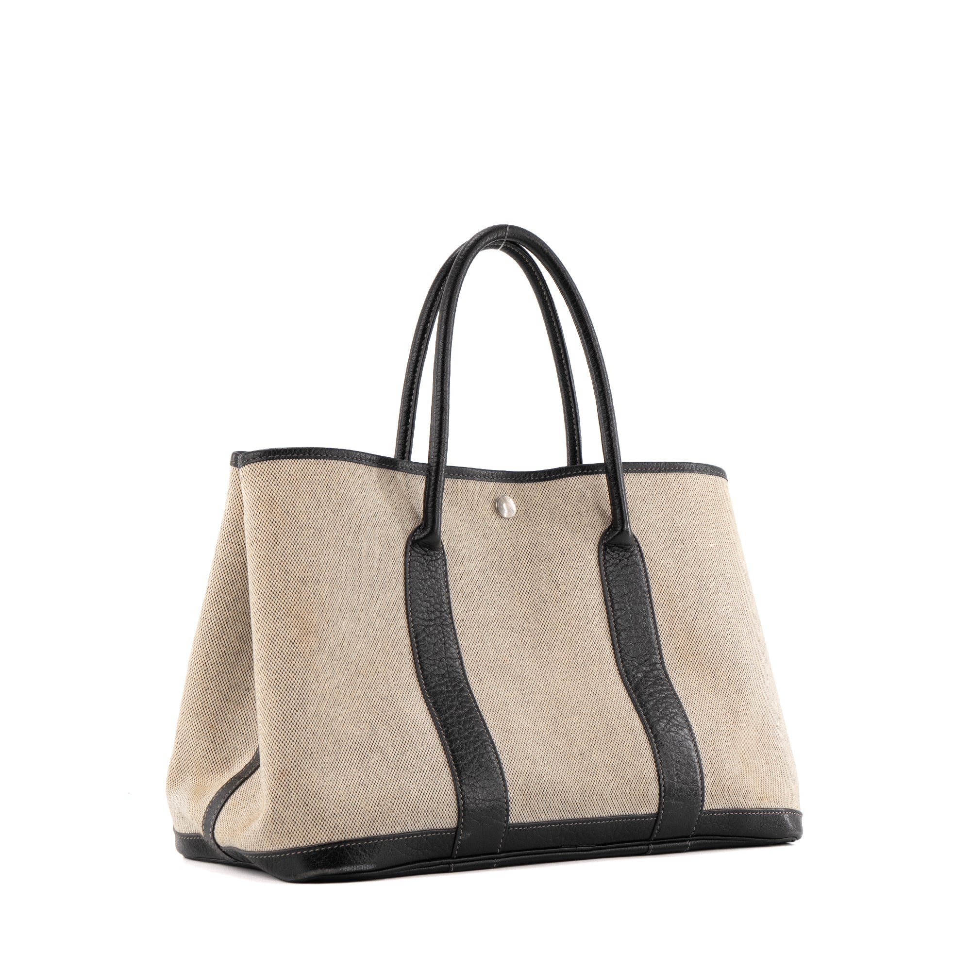 HERMÈS - Sac à main Garden Party Hermès en toile crème et cuir noir