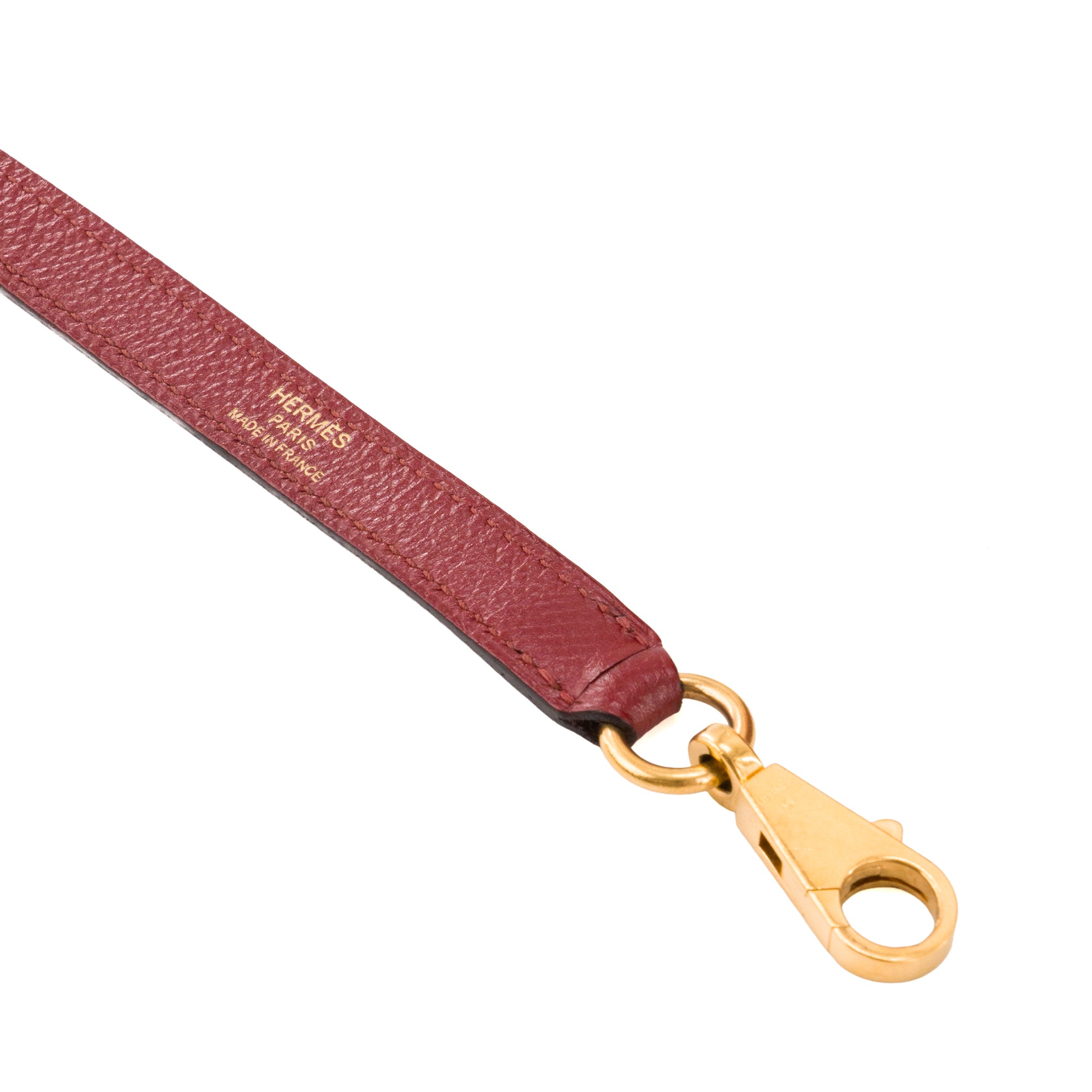 HERMÈS - Sac à bandoulière Kelly 28 Hermès en cuir epsom rouge grenat