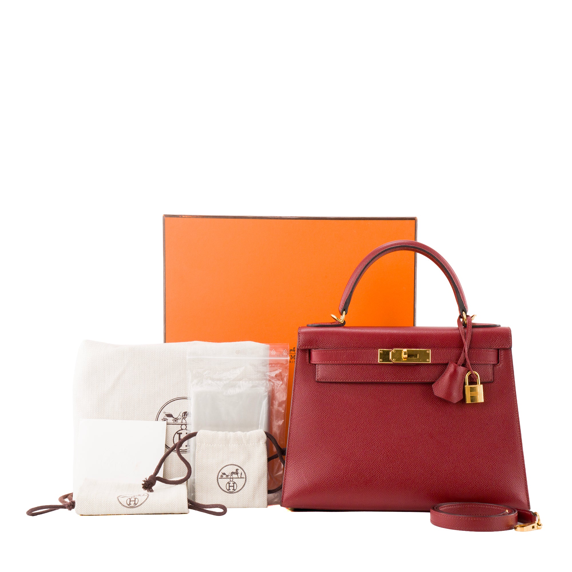 HERMÈS - Sac à bandoulière Kelly 28 Hermès en cuir epsom rouge grenat