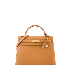 HERMÈS - Sac à main Kelly 32 Hermès en cuir ardennes marron gold vintage
