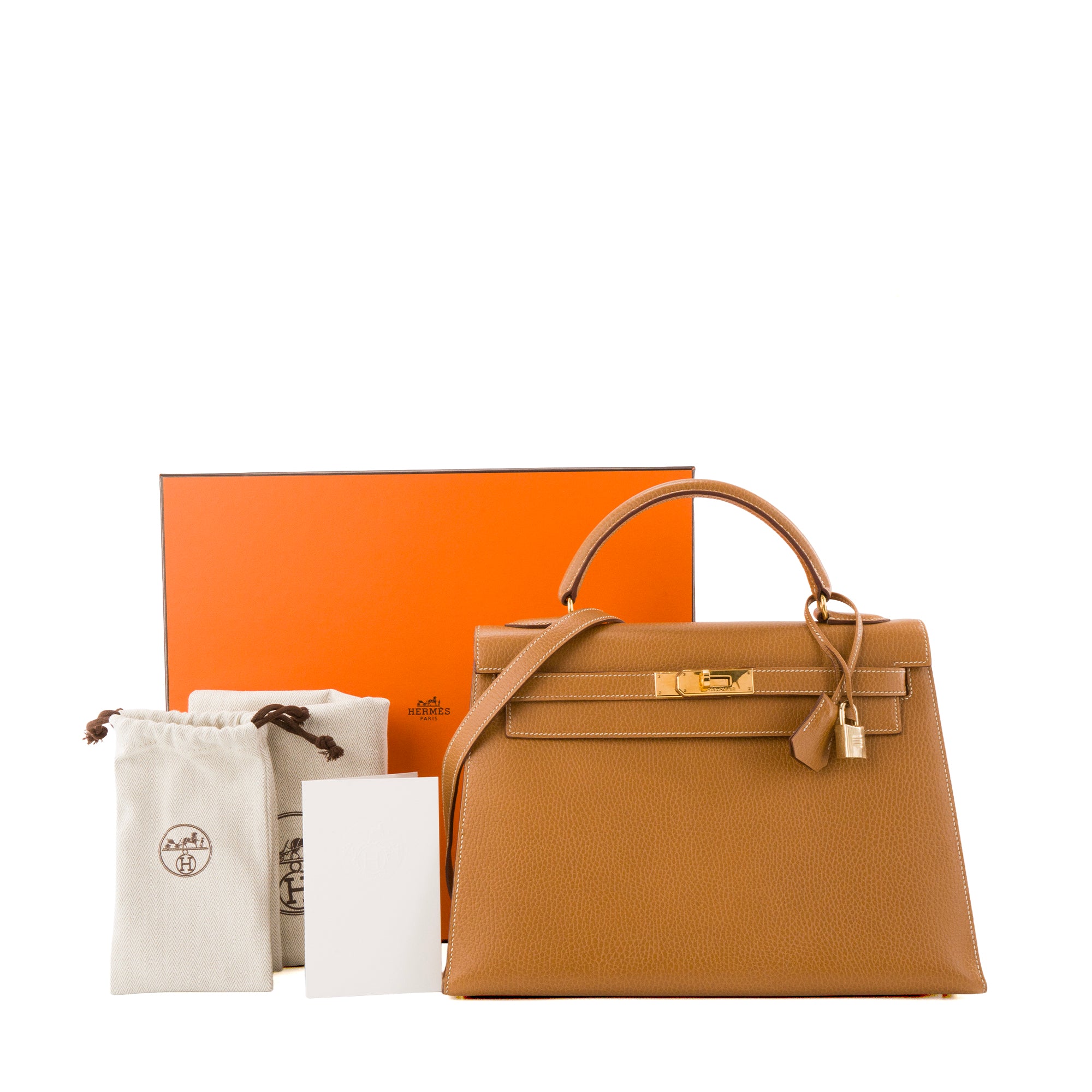 HERMÈS - Sac à main Kelly 32 Hermès en cuir ardennes marron gold vintage
