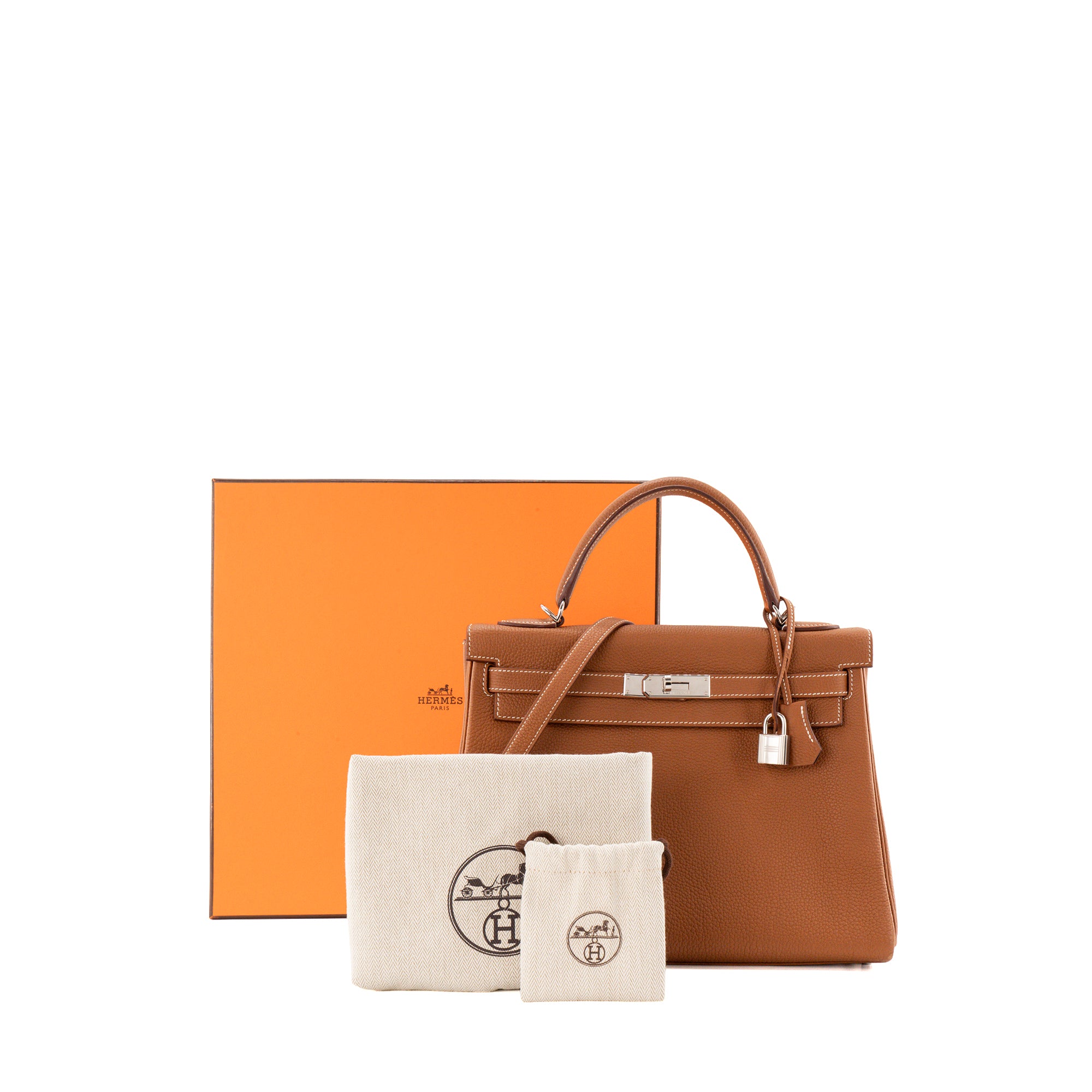HERMÈS - Sac à main Kelly 32 Hermès en cuir togo gold HSS