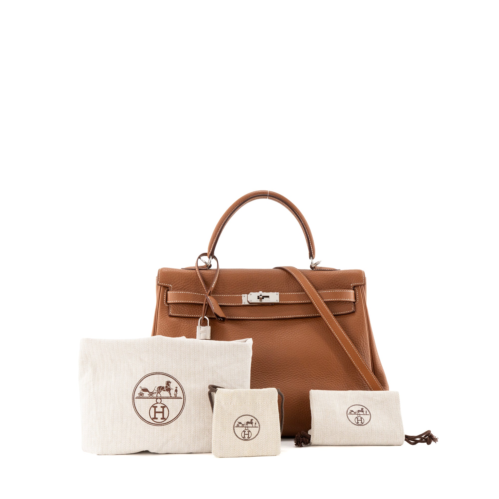 HERMÈS - Sac à main Kelly 35 Hermès en cuir clémence marron gold