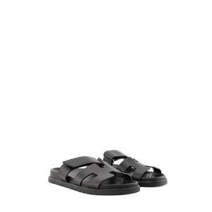 HERMÈS - Sandales Chypre Hermès en cuir lisse noir (T36)