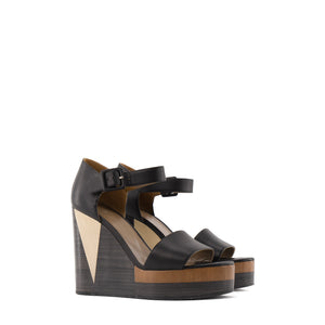 HERMÈS - Sandales compensées Hermès en cuir noir et bois (T38)