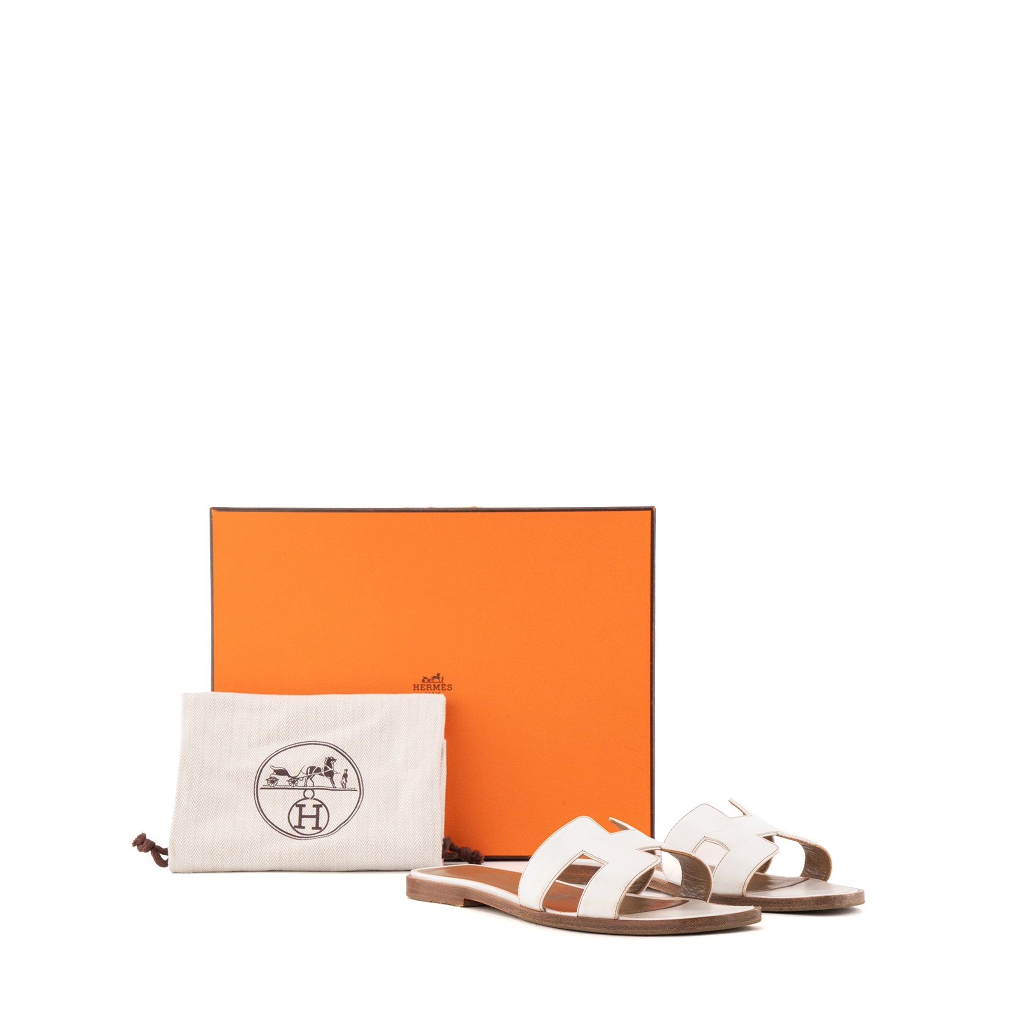 HERMÈS - Sandales Oran Hermès en cuir blanc (T35)