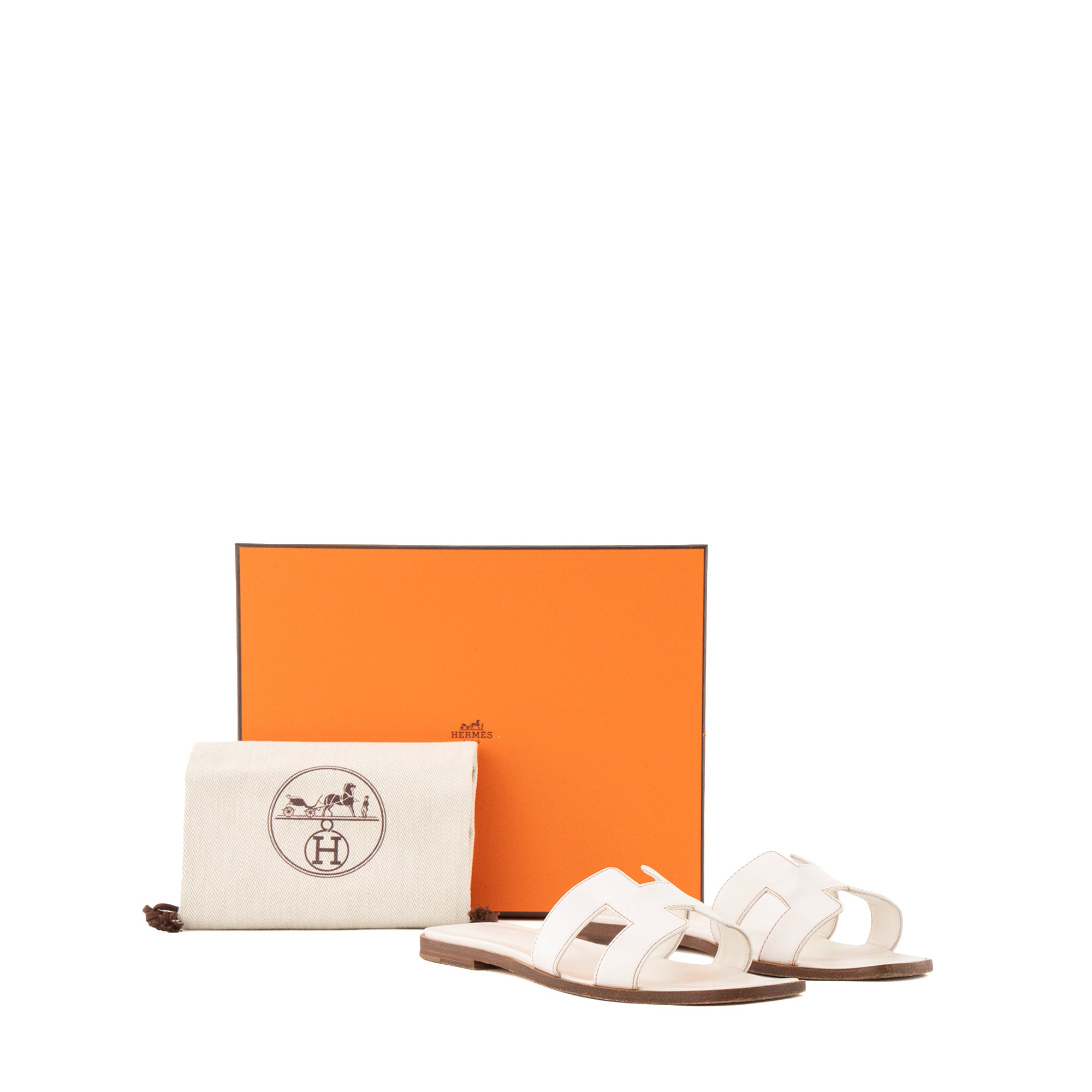 HERMÈS - Sandales Oran Hermès en cuir lisse blanc (T37)