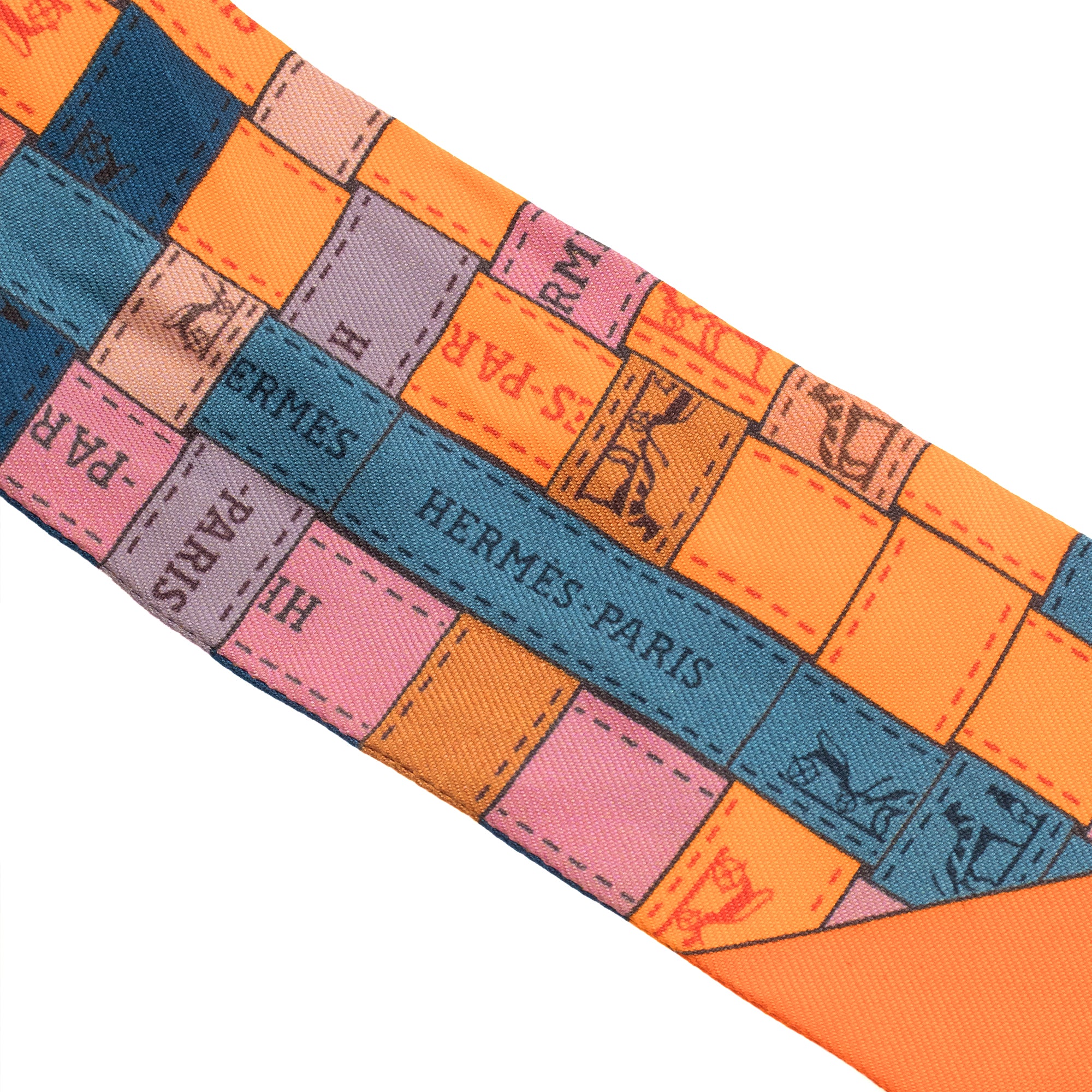 HERMÈS - Twilly Bolduc Hermès en soie multicolore