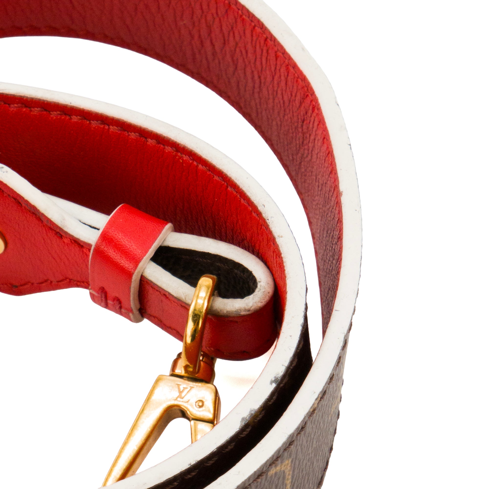 LOUIS VUITTON - Bandoulière de sac Louis Vuitton en toile enduite monogrammée et cuir rouge