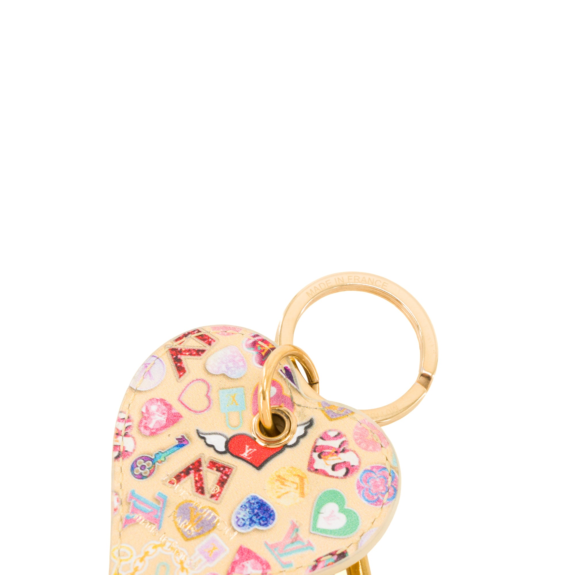 LOUIS VUITTON - Bijou de sac Coeur Louis Vuitton en cuir jaune