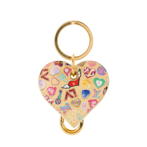 LOUIS VUITTON - Bijou de sac Coeur Louis Vuitton en cuir jaune