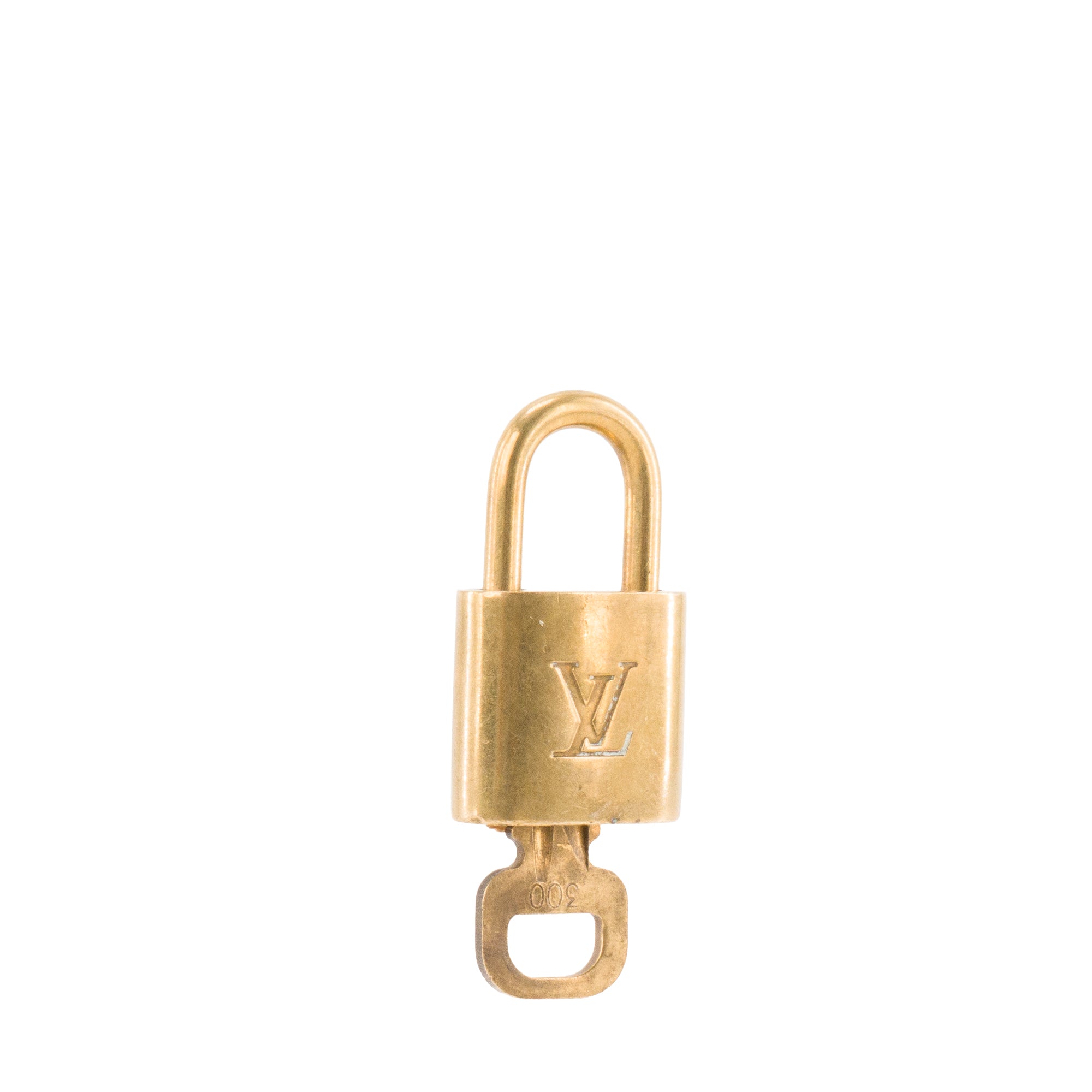 LOUIS VUITTON - Cadenas avec clé Louis Vuitton en métal doré