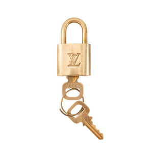 LOUIS VUITTON - Cadenas avec clés Louis Vuitton en métal doré