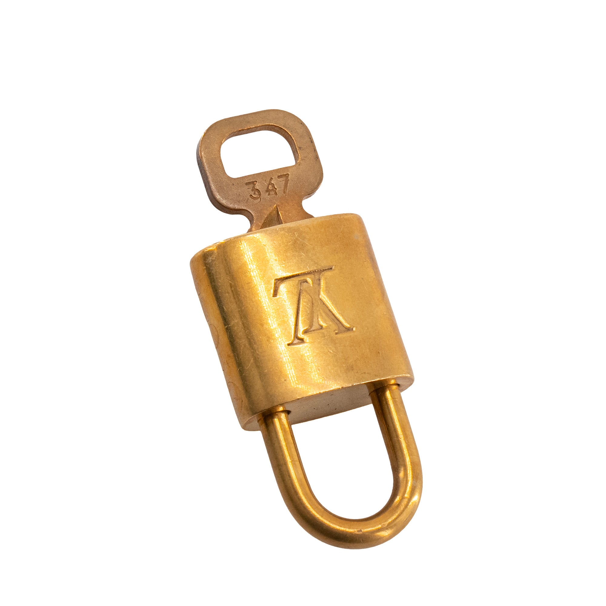 LOUIS VUITTON - Cadenas et clé Louis Vuitton en métal doré