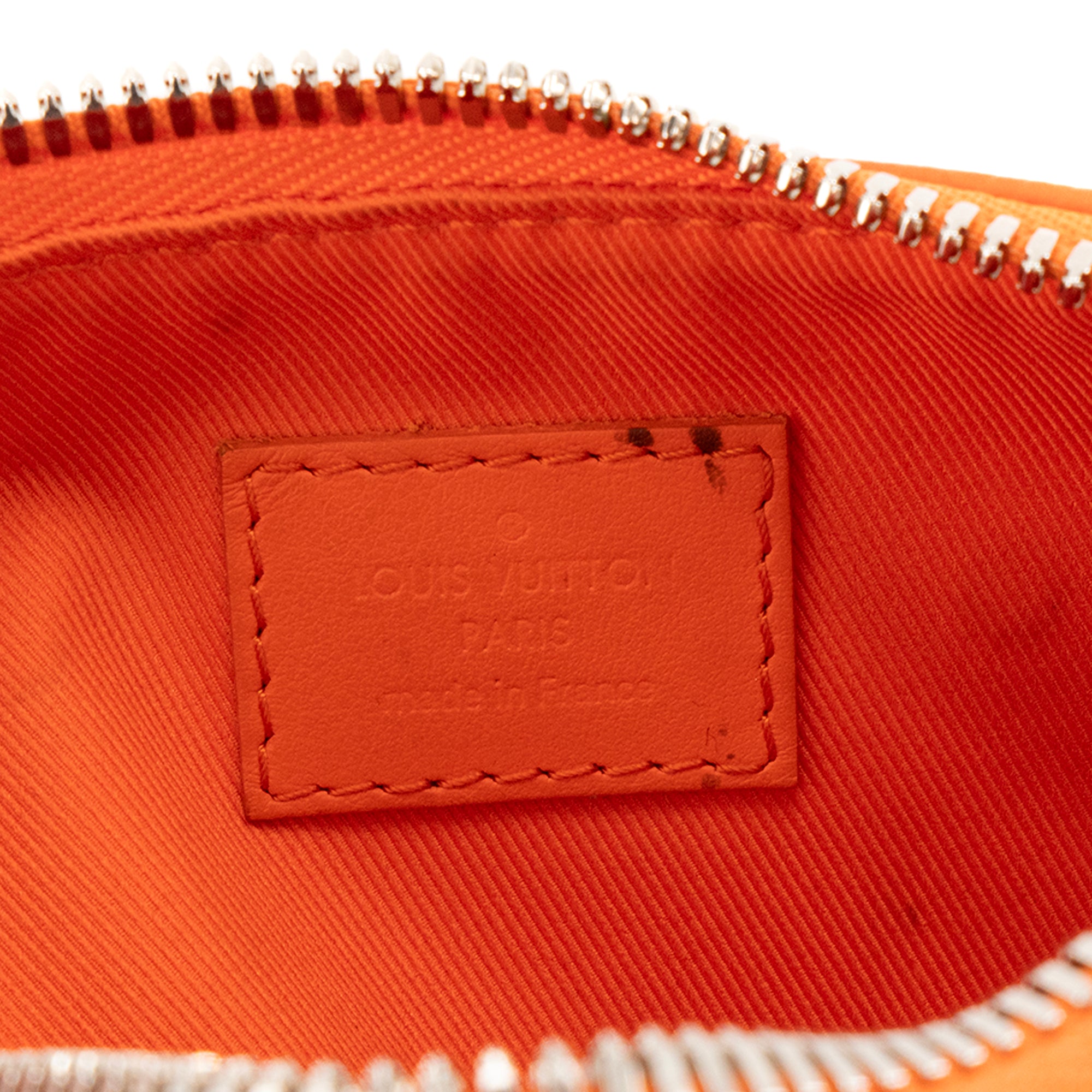 LOUIS VUITTON - Sac à bandoulière Keepall XS Louis Vuitton en cuir grainé orange