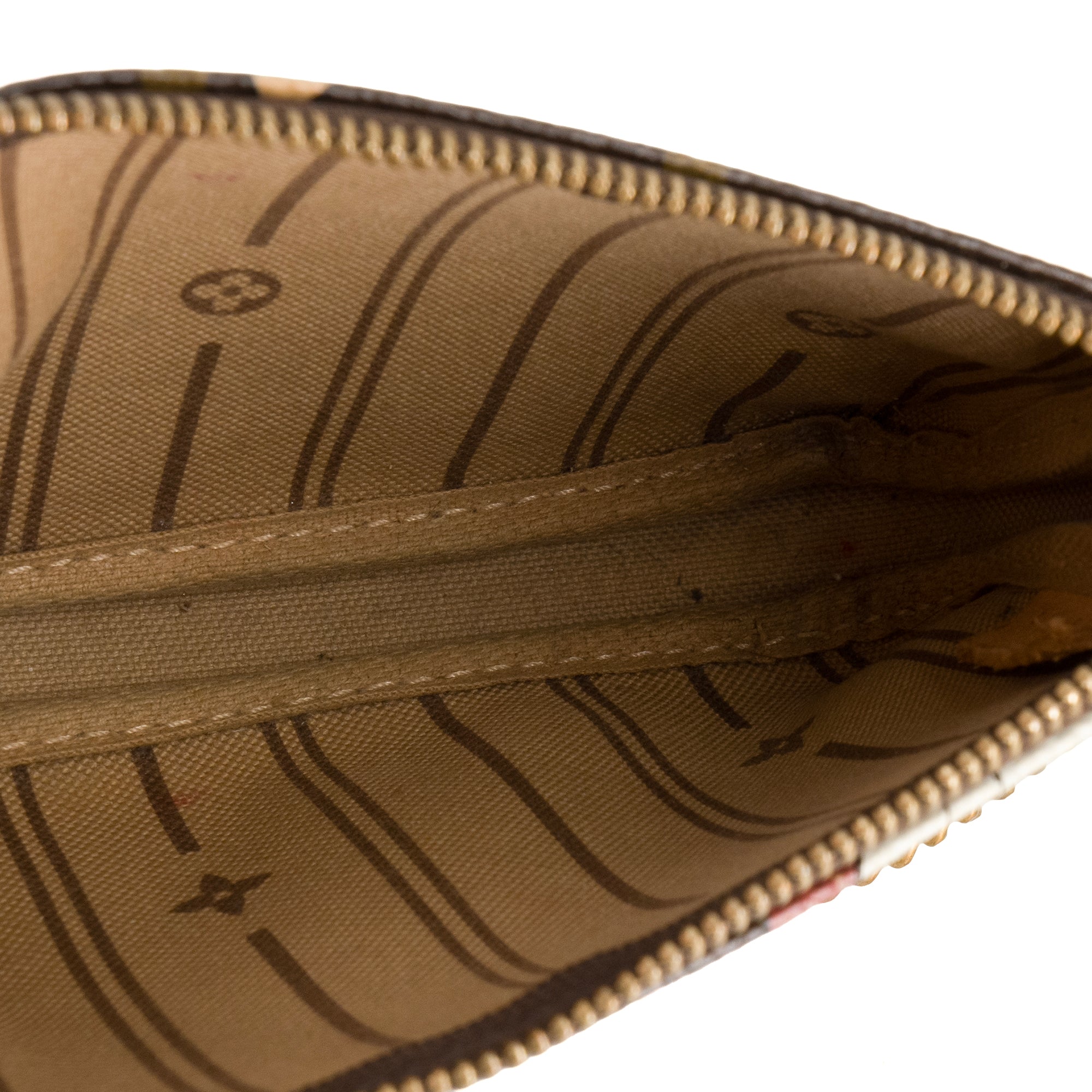 LOUIS VUITTON - Pochette Accessoire Mini Louis Vuitton en toile enduite monogrammée édition limitée