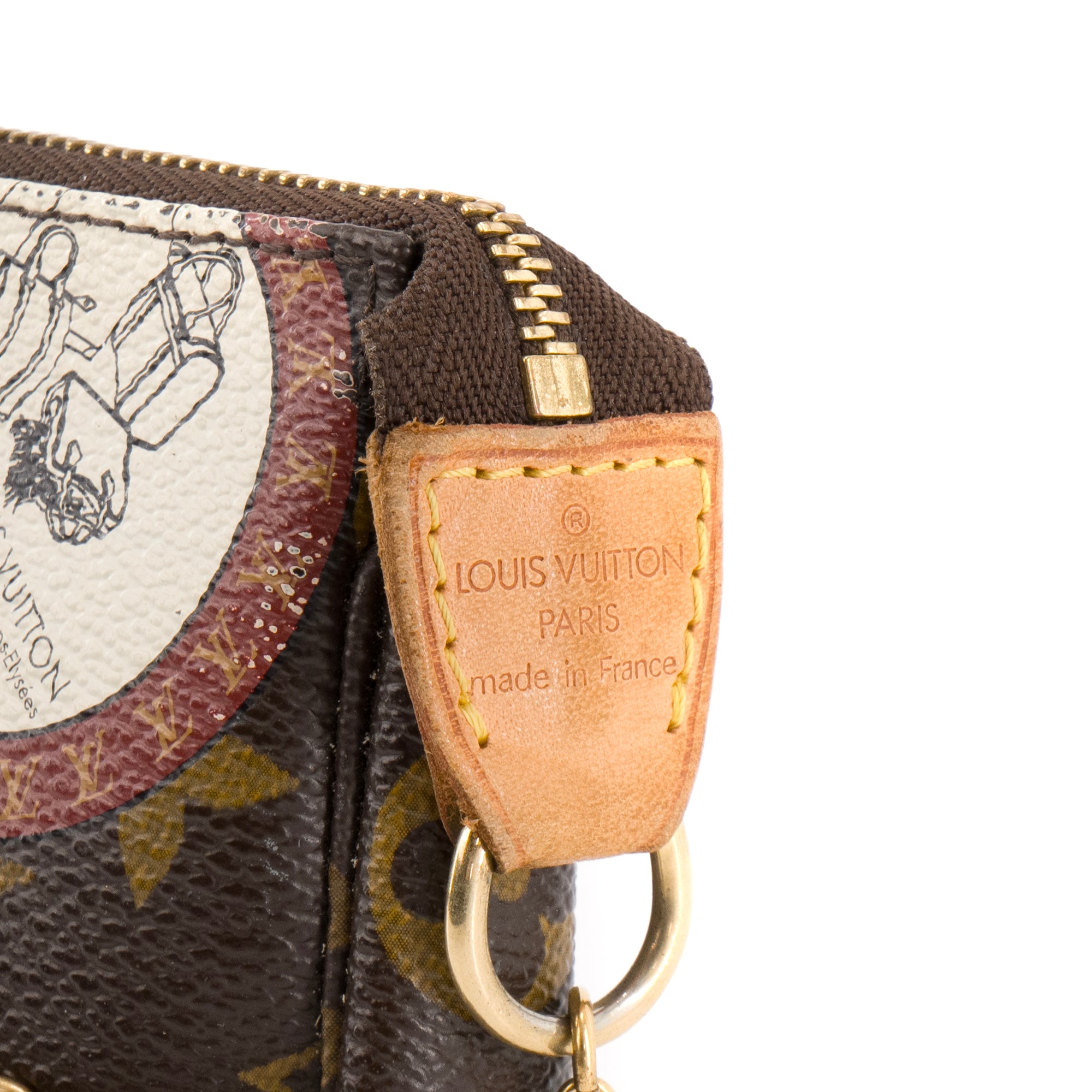 LOUIS VUITTON - Pochette Accessoire Mini Louis Vuitton en toile enduite monogrammée édition limitée