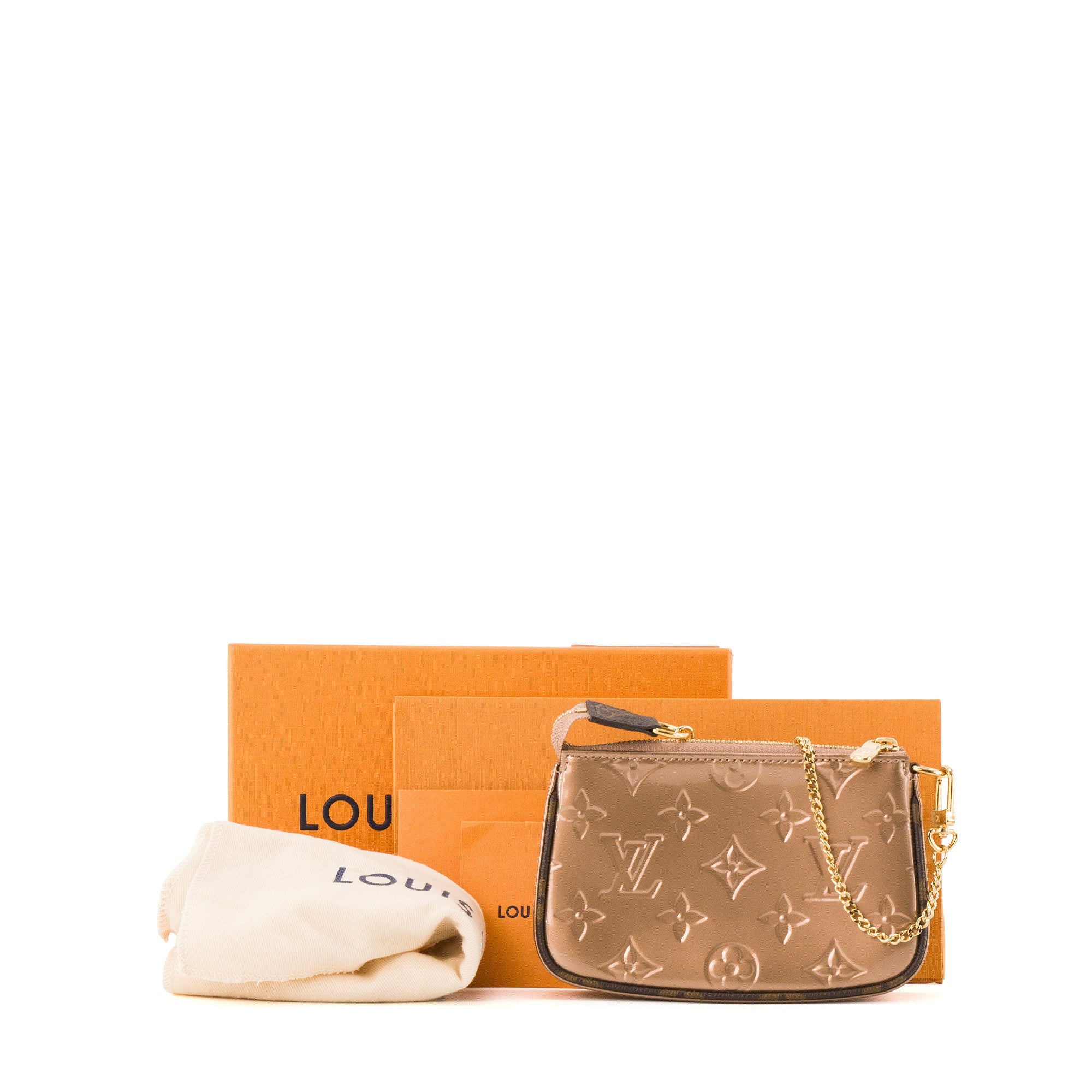LOUIS VUITTON - Pochette accessoires Louis Vuitton en cuir verni doré métallisé