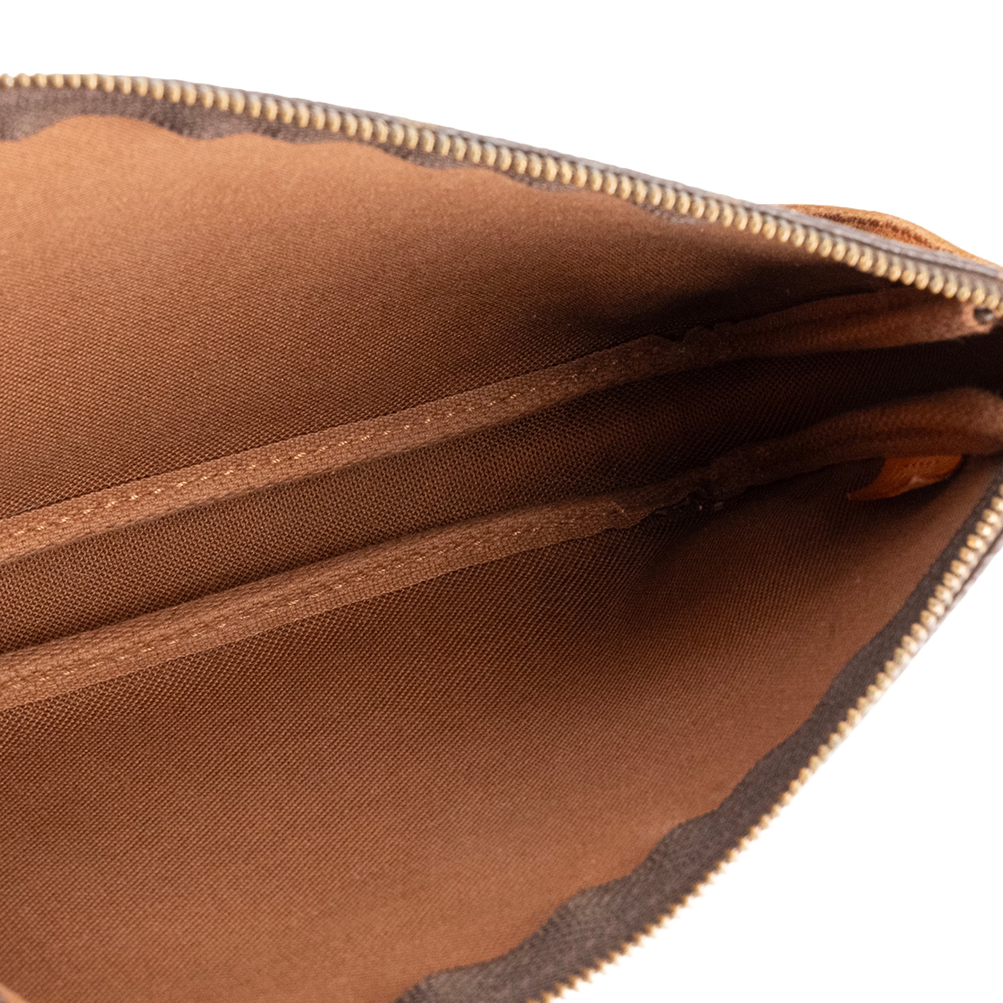 LOUIS VUITTON - Pochette Accessoires Louis Vuitton en toile enduite monogrammée vintage