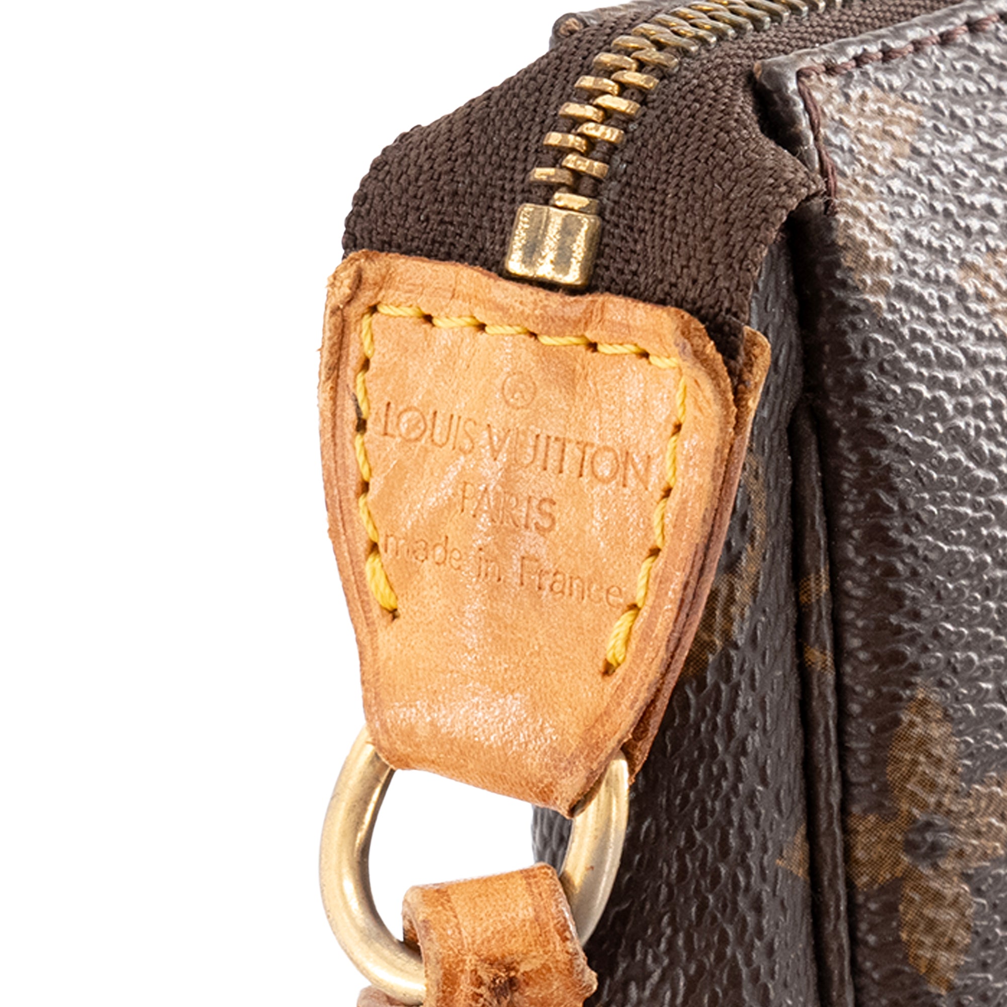 LOUIS VUITTON - Pochette Accessoires Louis Vuitton en toile enduite monogrammée vintage