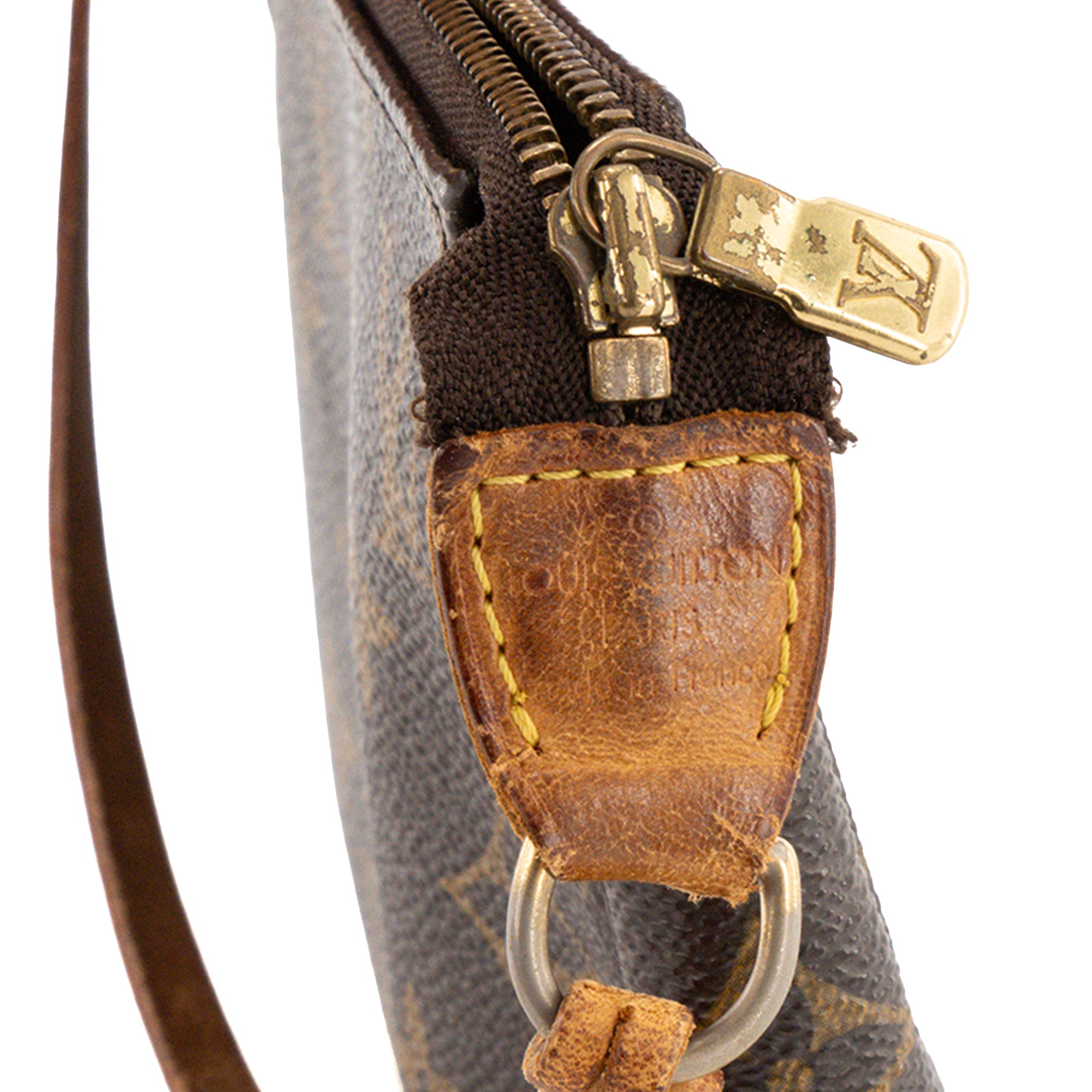 LOUIS VUITTON - Pochette Accessoires Louis Vuitton en toile enduite monogrammée vintage