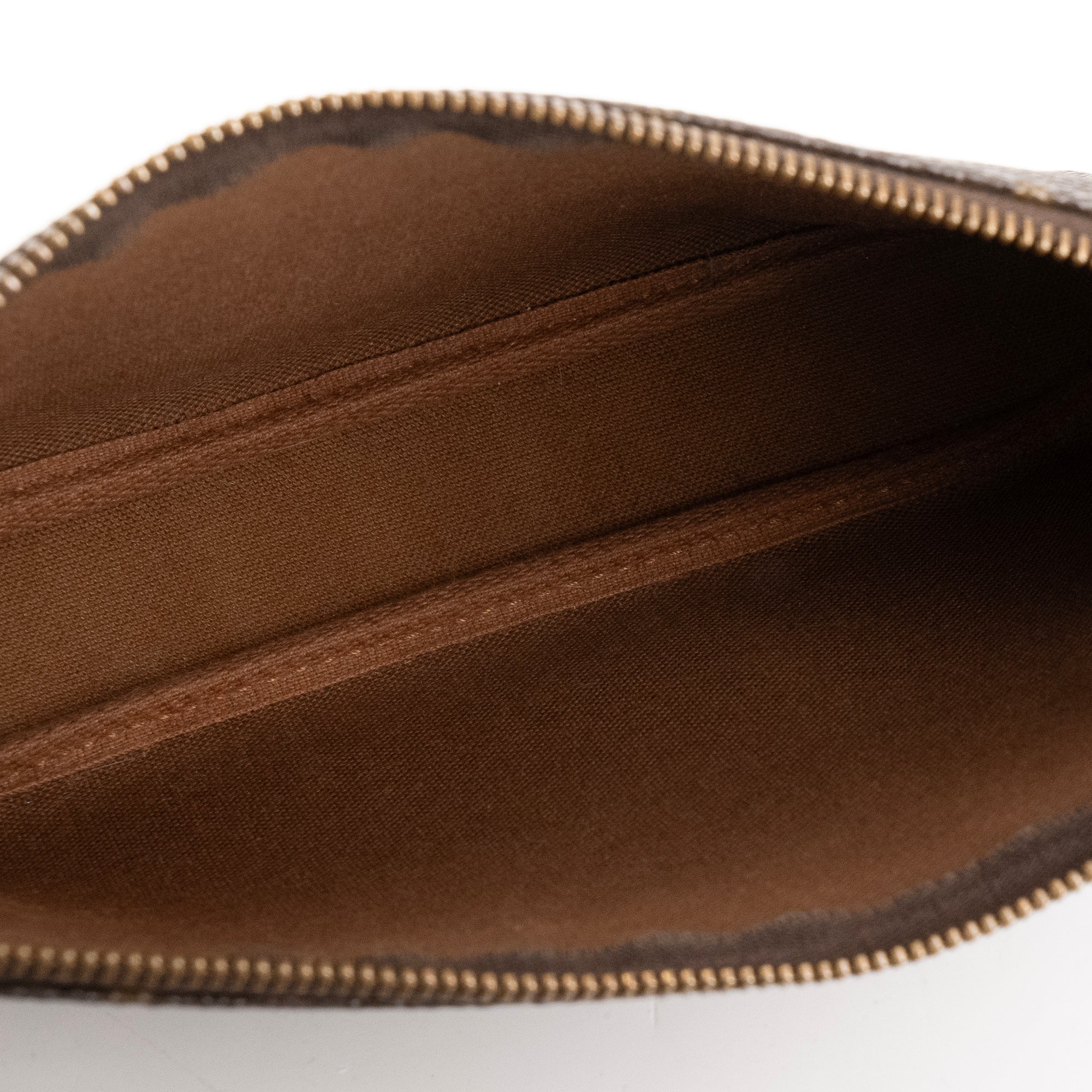 LOUIS VUITTON - Pochette Accessoires Louis Vuitton en toile enduite monogrammée vintage