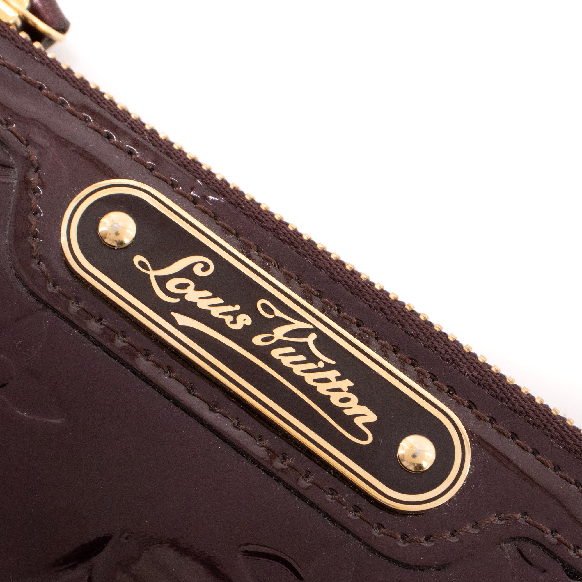 LOUIS VUITTON - Pochette-clés Louis Vuitton en cuir verni bordeaux