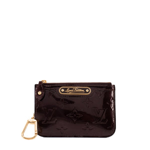 LOUIS VUITTON - Pochette-clés Louis Vuitton en cuir verni bordeaux