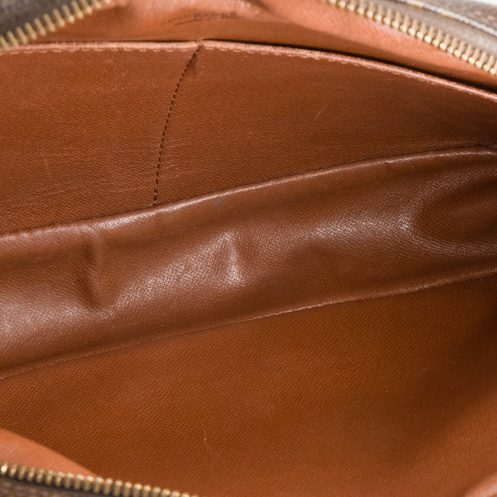 LOUIS VUITTON - Pochette Compiegne Louis Vuitton en toile enduite monogrammée vintage