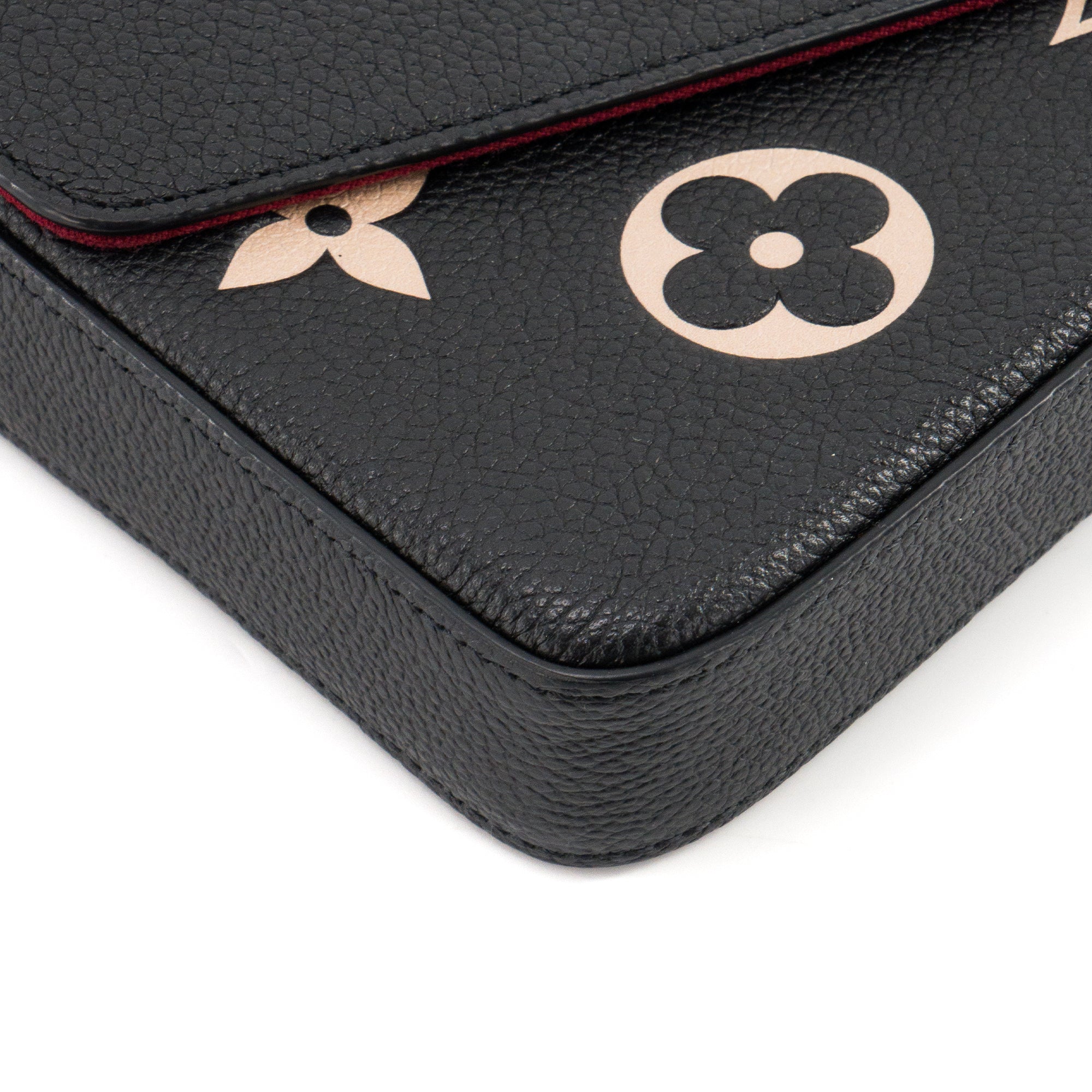 LOUIS VUITTON - Pochette Félicie Monogram Giant Louis Vuitton en cuir grainé noir