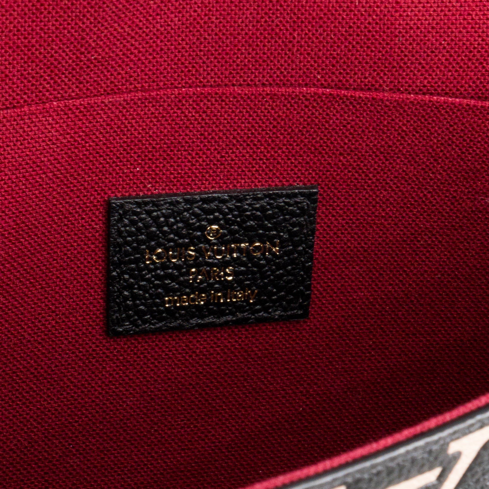 LOUIS VUITTON - Pochette Félicie Monogram Giant Louis Vuitton en cuir grainé noir