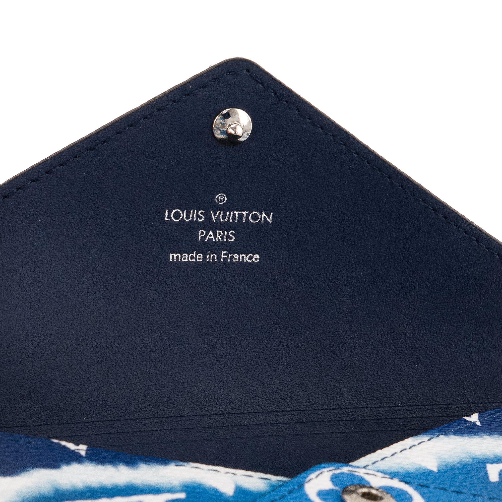 LOUIS VUITTON - Pochette Kirigami MM Escale Louis Vuitton en toile enduite monogrammée bleue