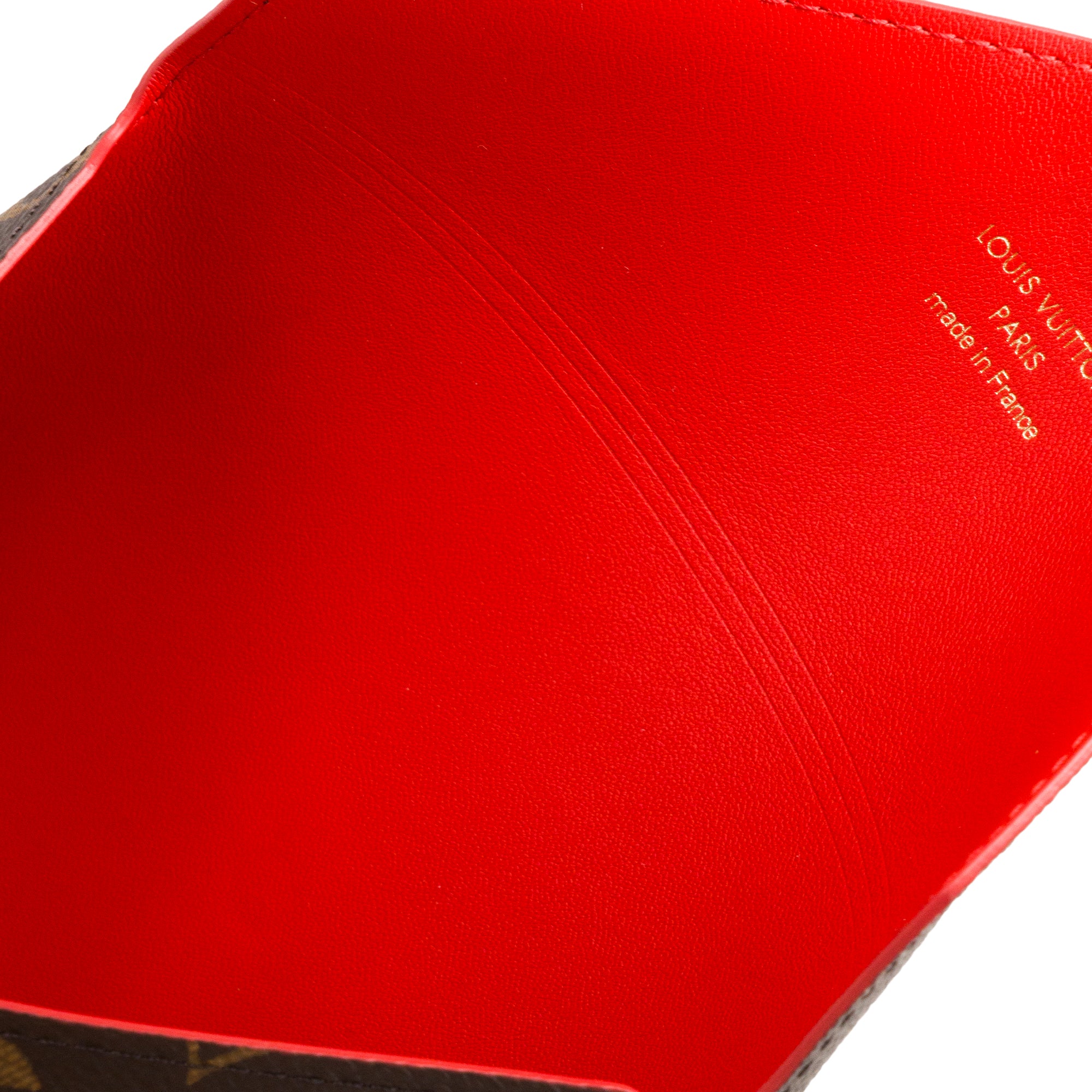 LOUIS VUITTON - Pochette Kirigami MM Louis Vuitton en toile enduite monogrammée