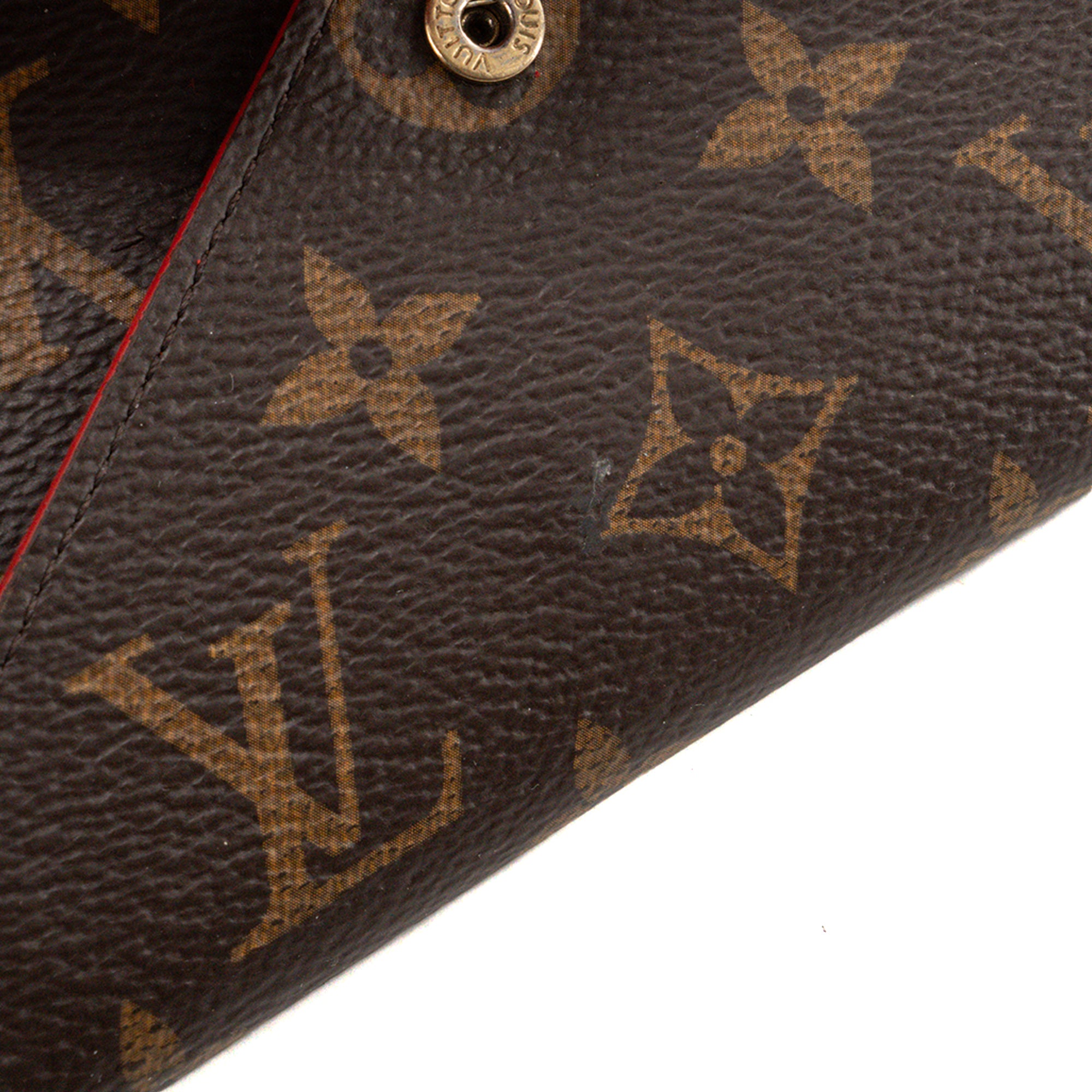 LOUIS VUITTON - Pochette Kirigami MM Louis Vuitton en toile enduite monogrammée